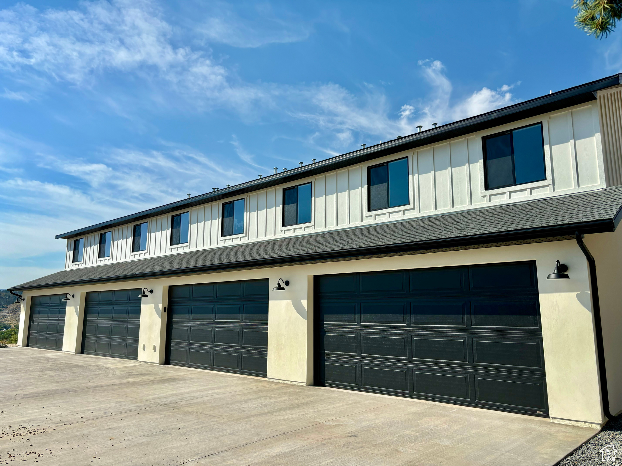 View of front of property with a garage