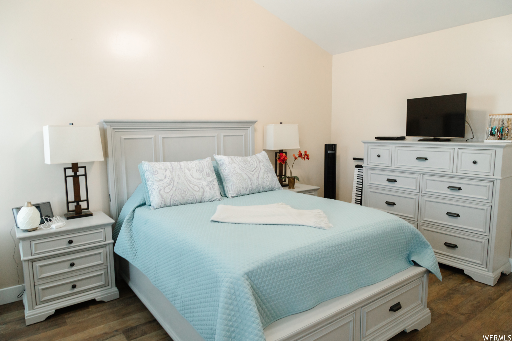 View of hardwood floored bedroom