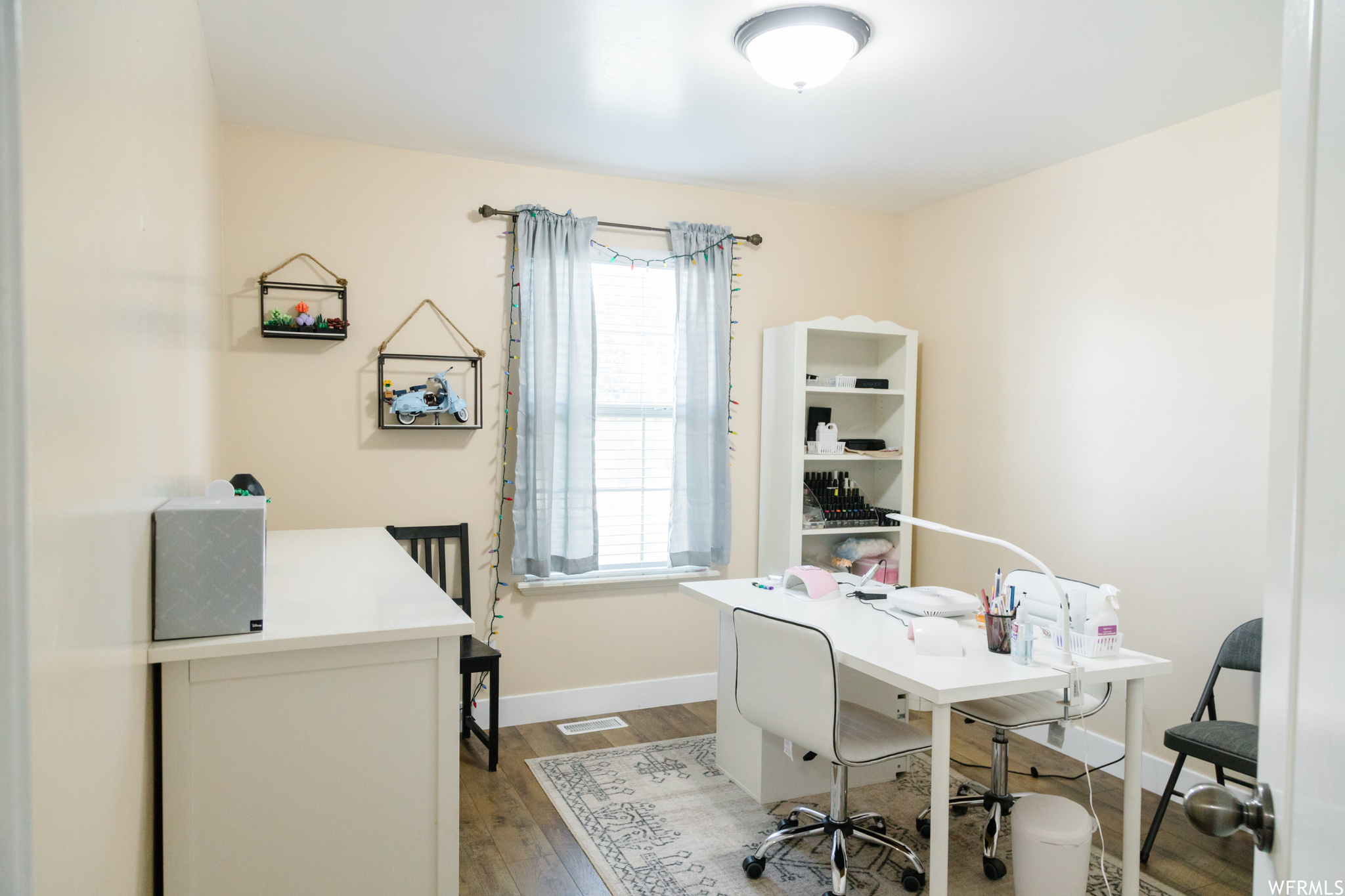 View of wood floored home office