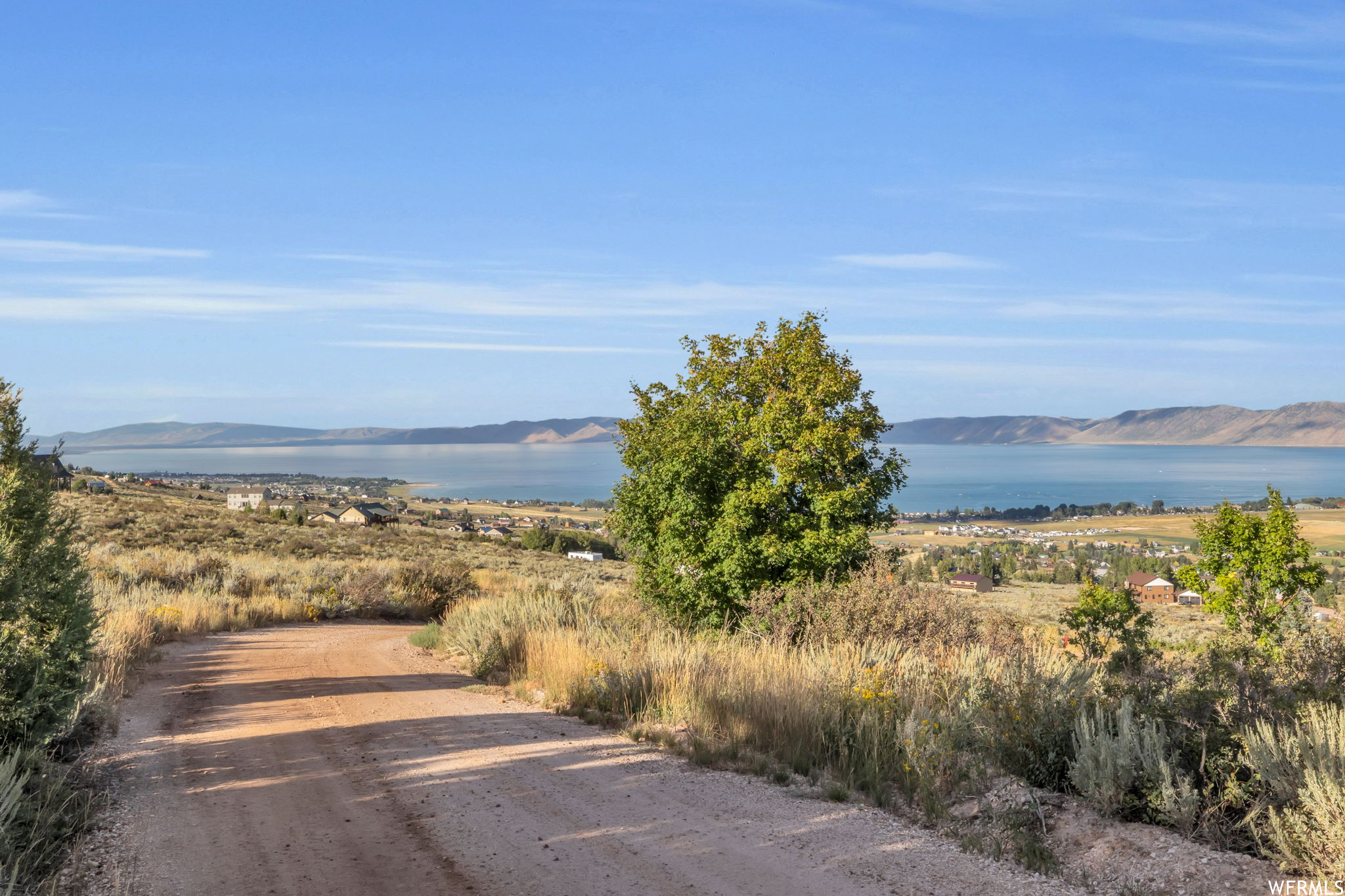 View of street with a water and mountain view