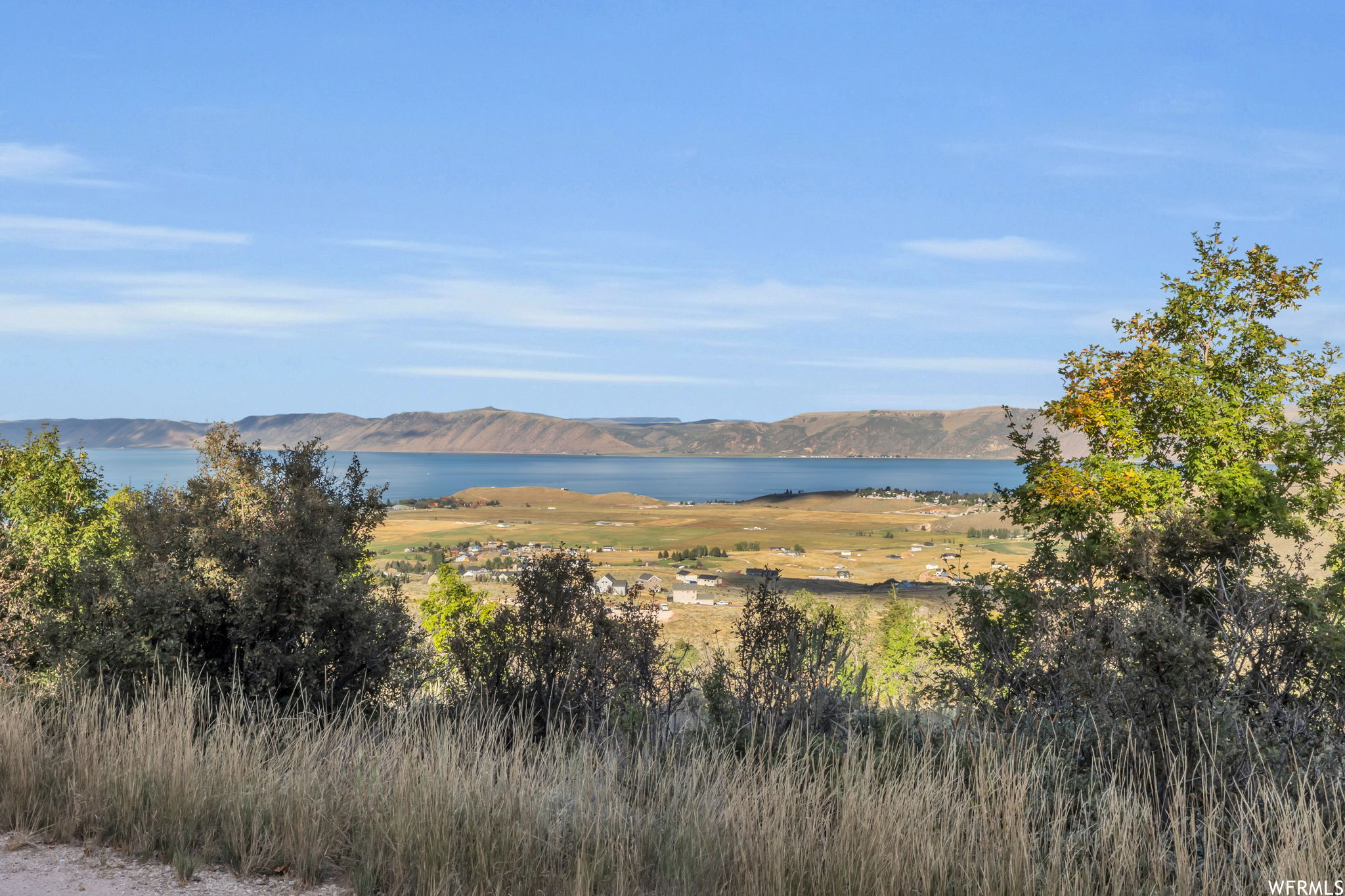 Property view of water with a mountain view