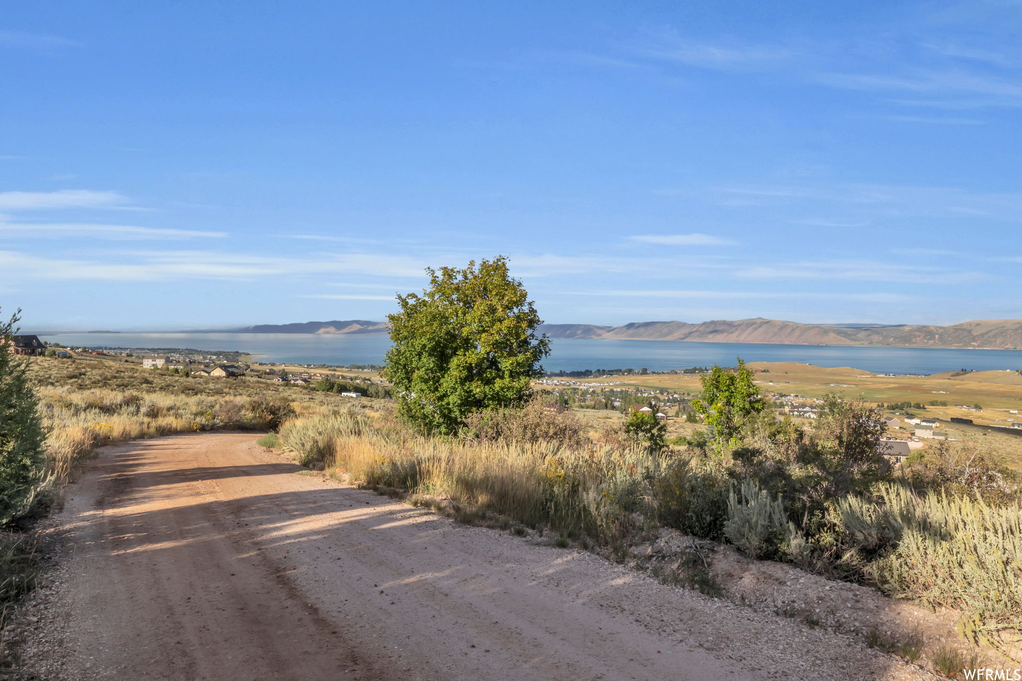 View of street with a water and mountain view