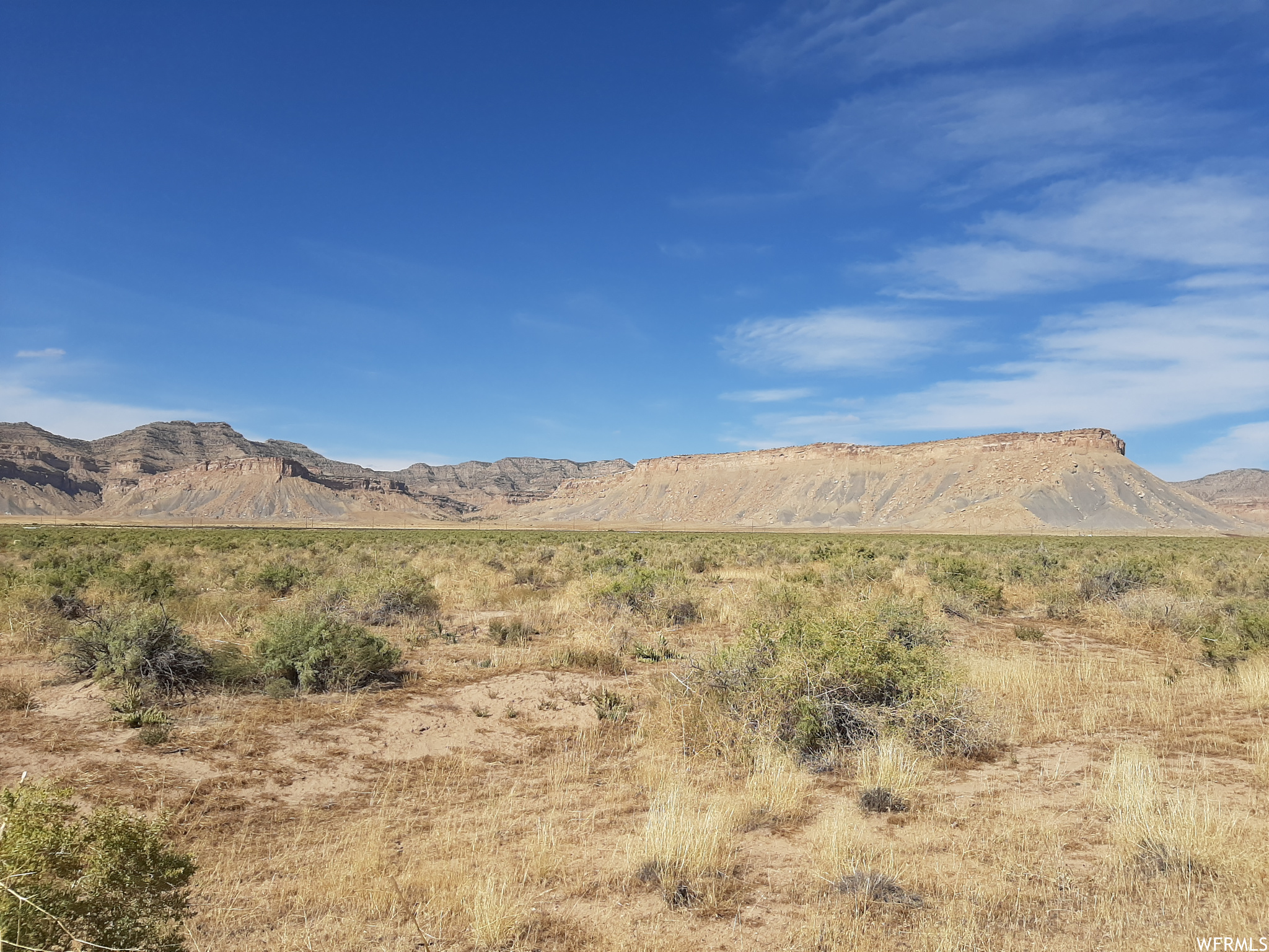 Mostly flat land with a few small hills.