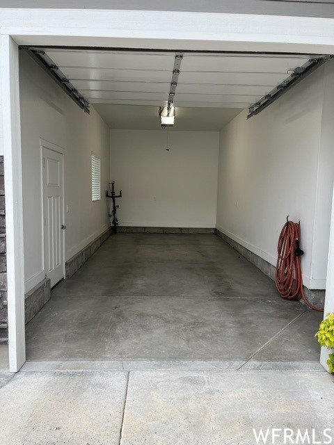 Offset oversized 3rd car garage. Hot and cold water spigot. Fully finished and professionally painted.
