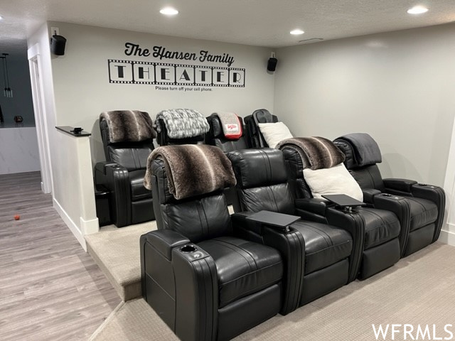 Home theater room with raised seating