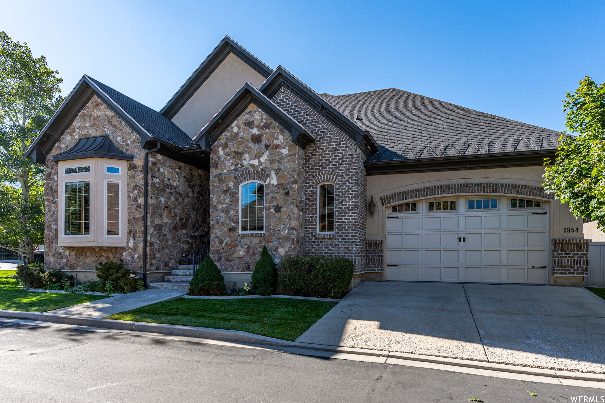 View of front of home with a garage