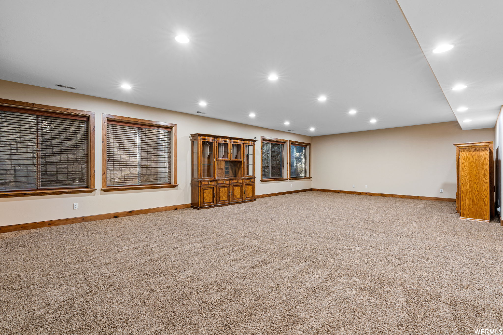 Interior space with light colored carpet