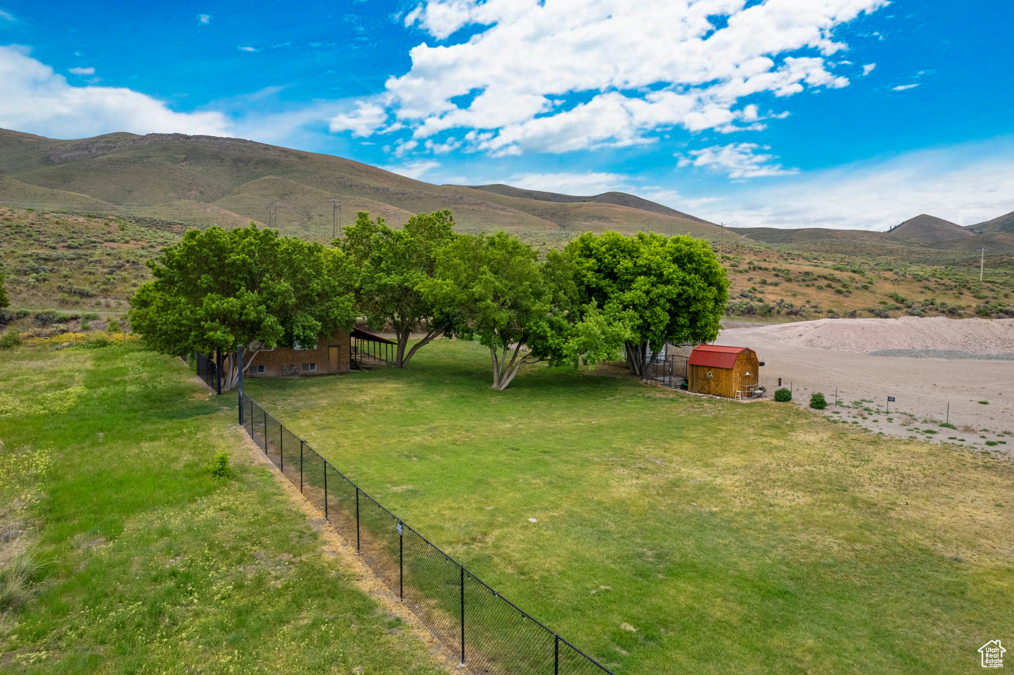 Exterior space with a mountain view and a rural view