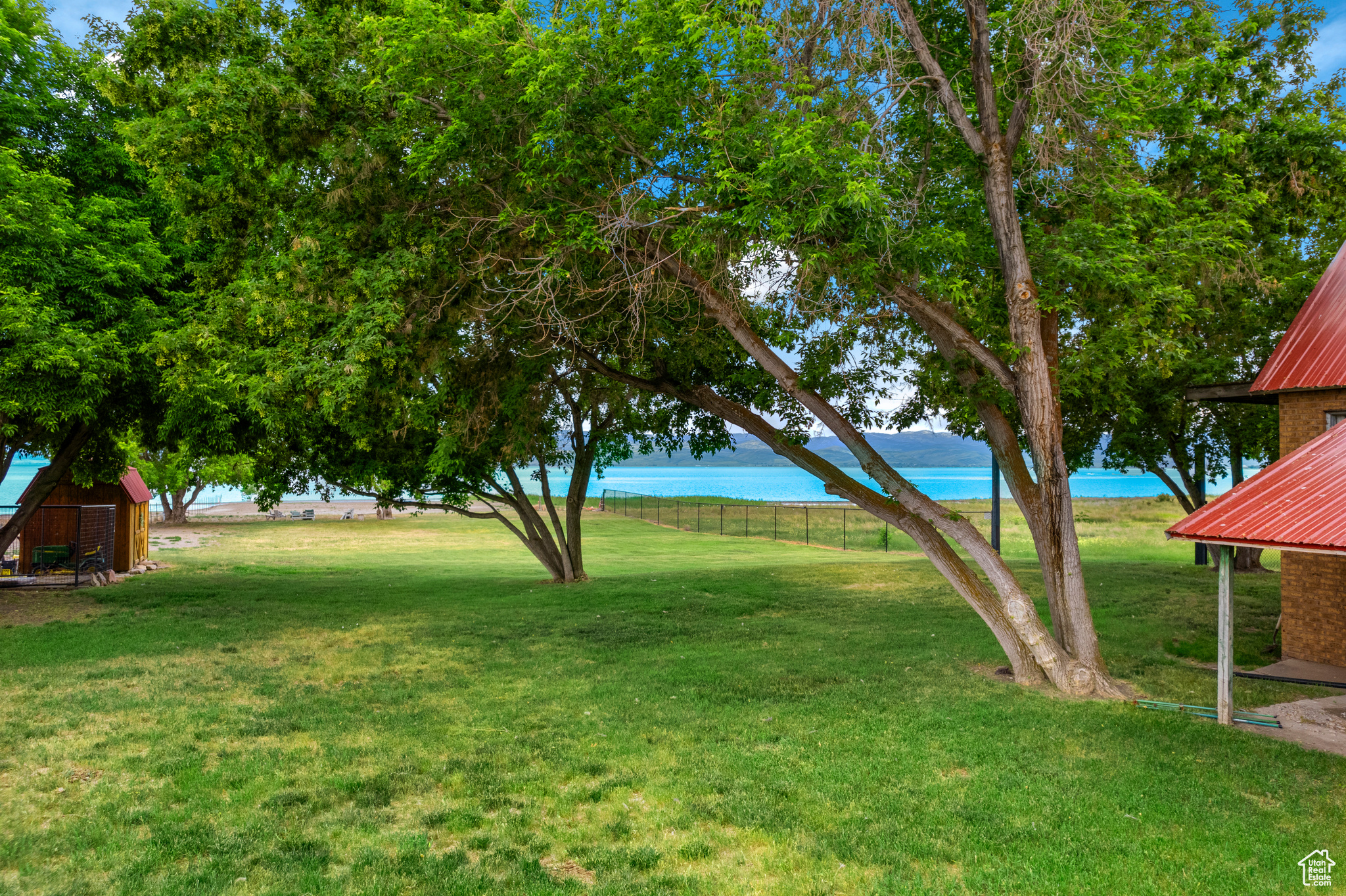 View of yard with a water view