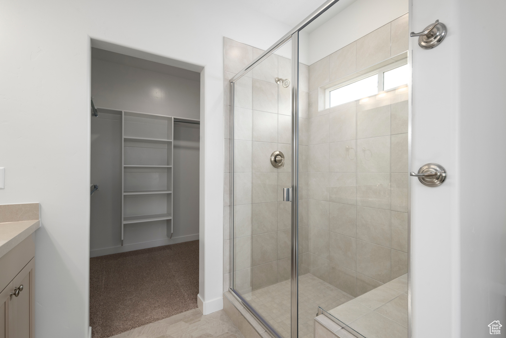 PRIMARY WALK IN SHOWER WITH BENCH