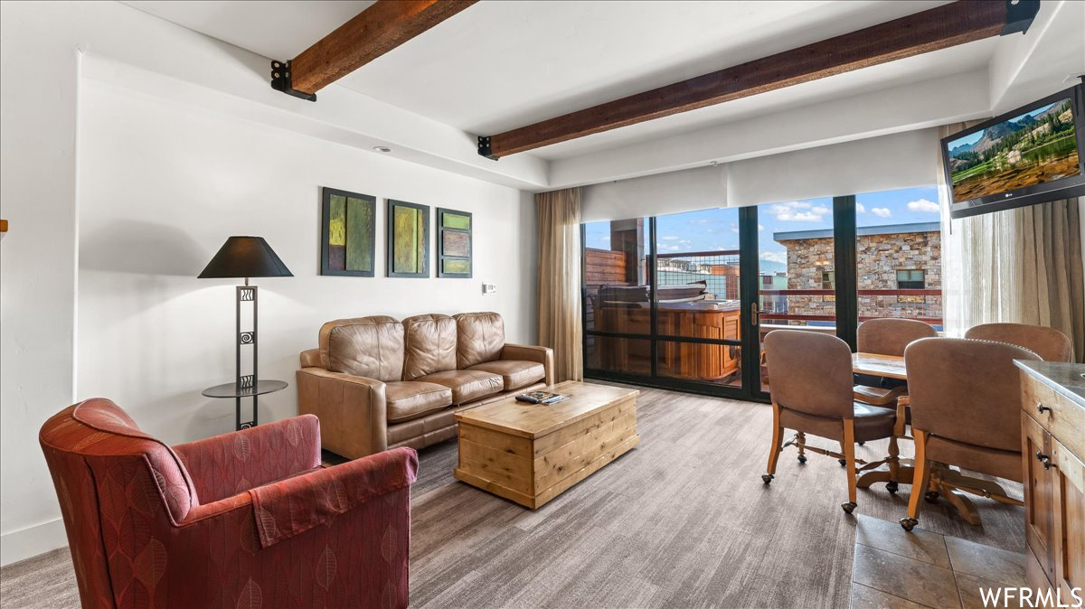 Living room with beam ceiling