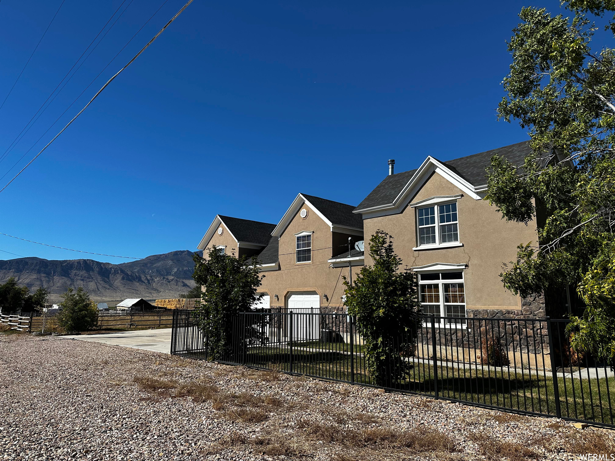 Front of property with a mountain view