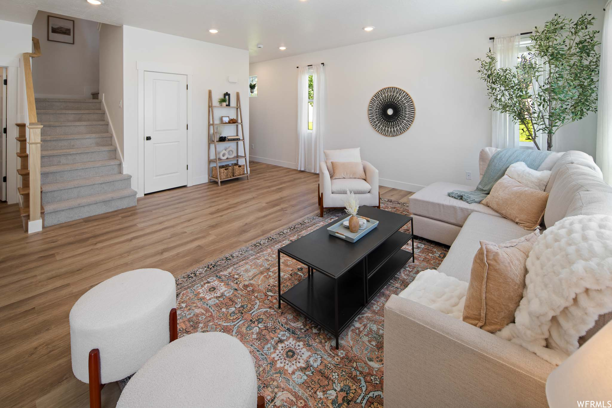 Living room with light hardwood floors
