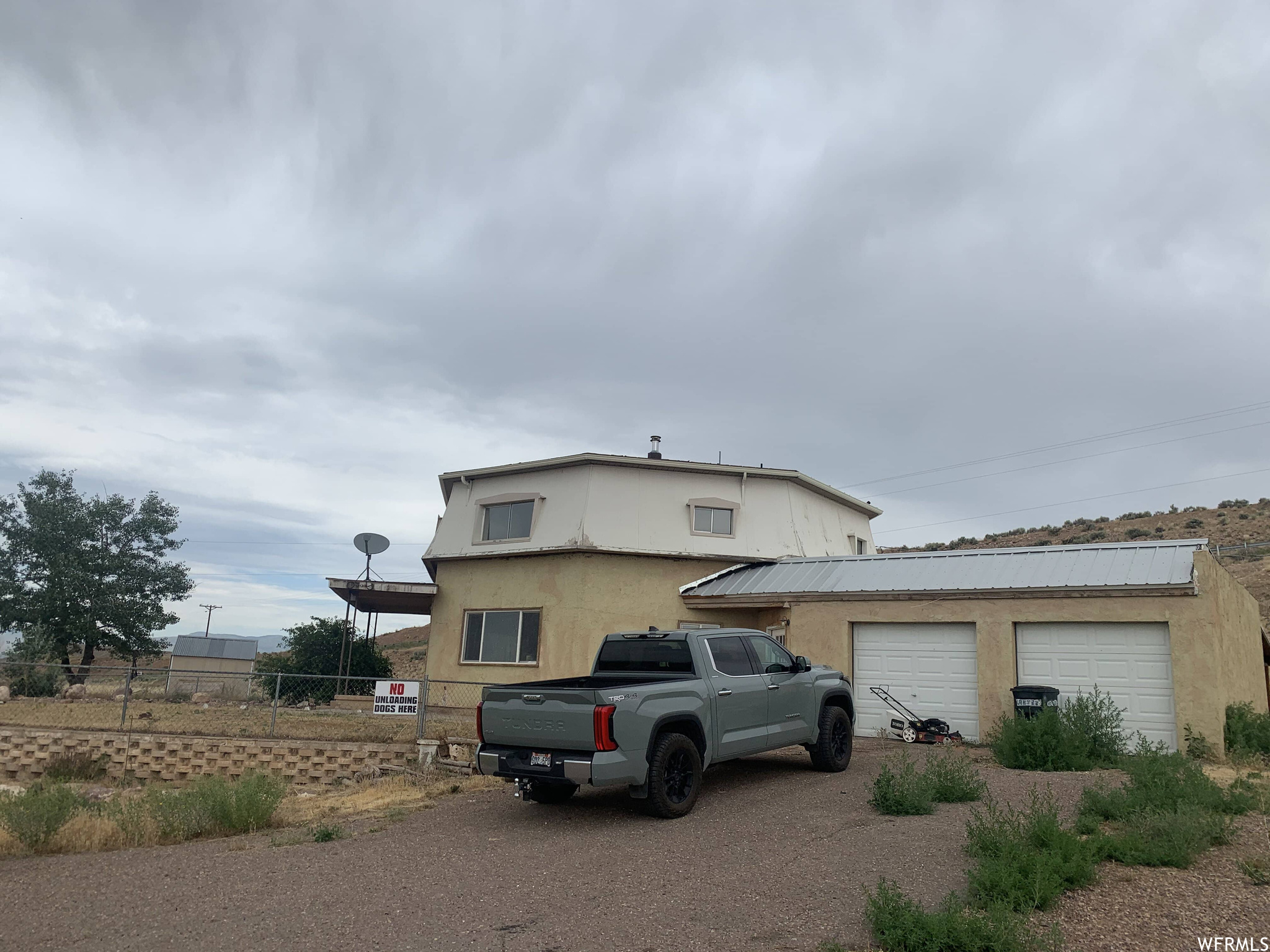 Front of property featuring a garage