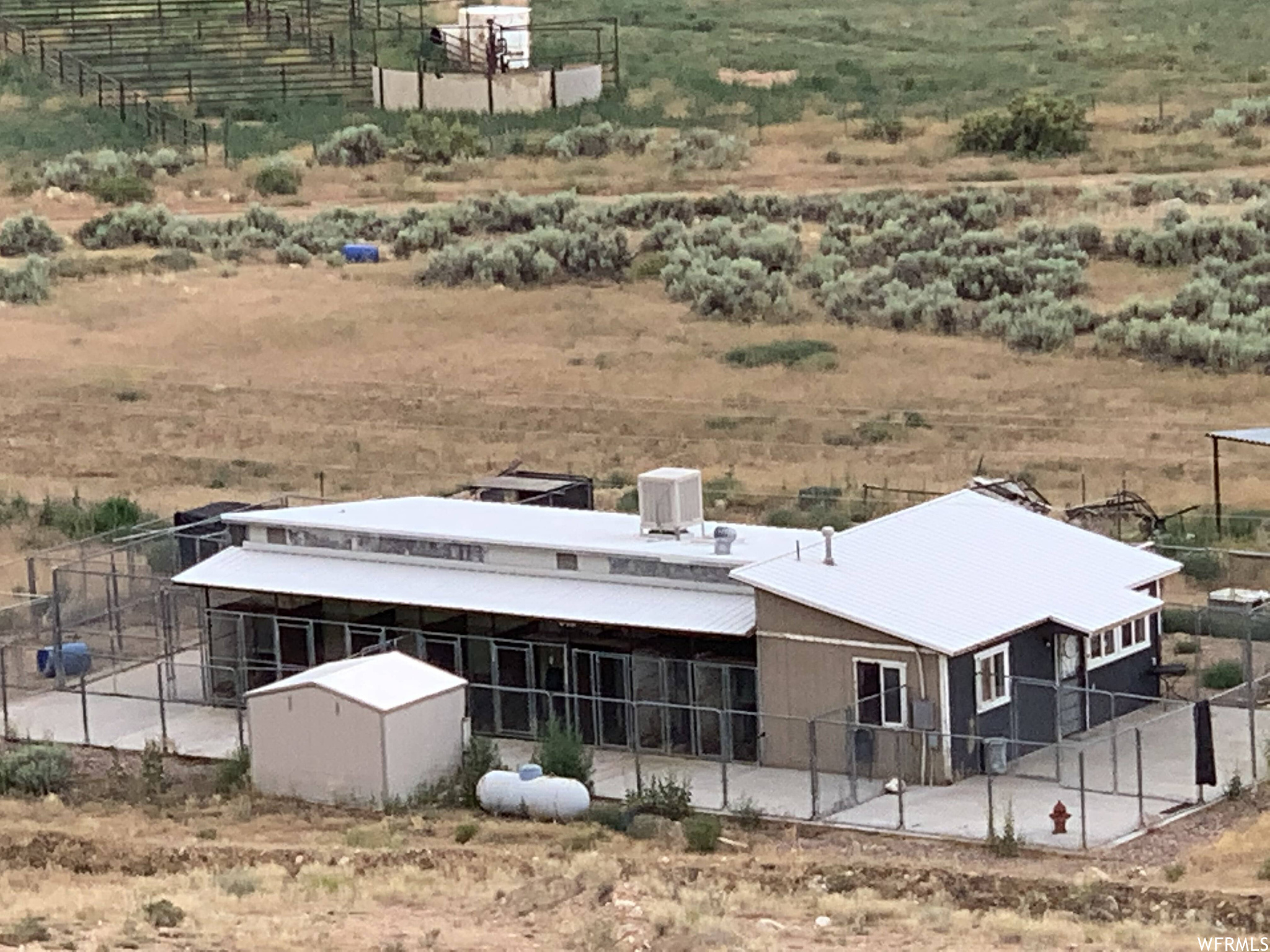 Kennel building space featuring a rural view