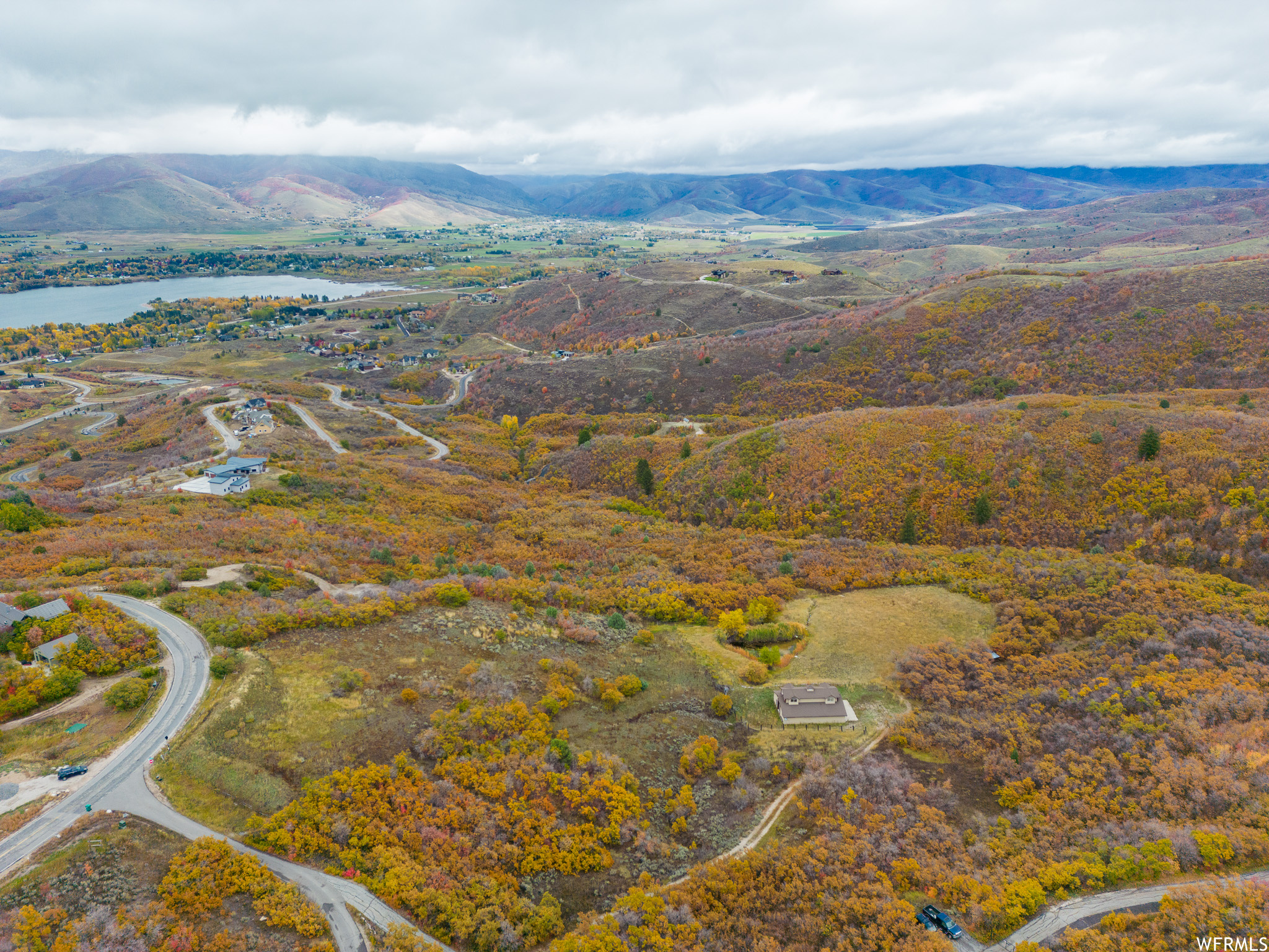 Bird's eye view with a water and mountain view