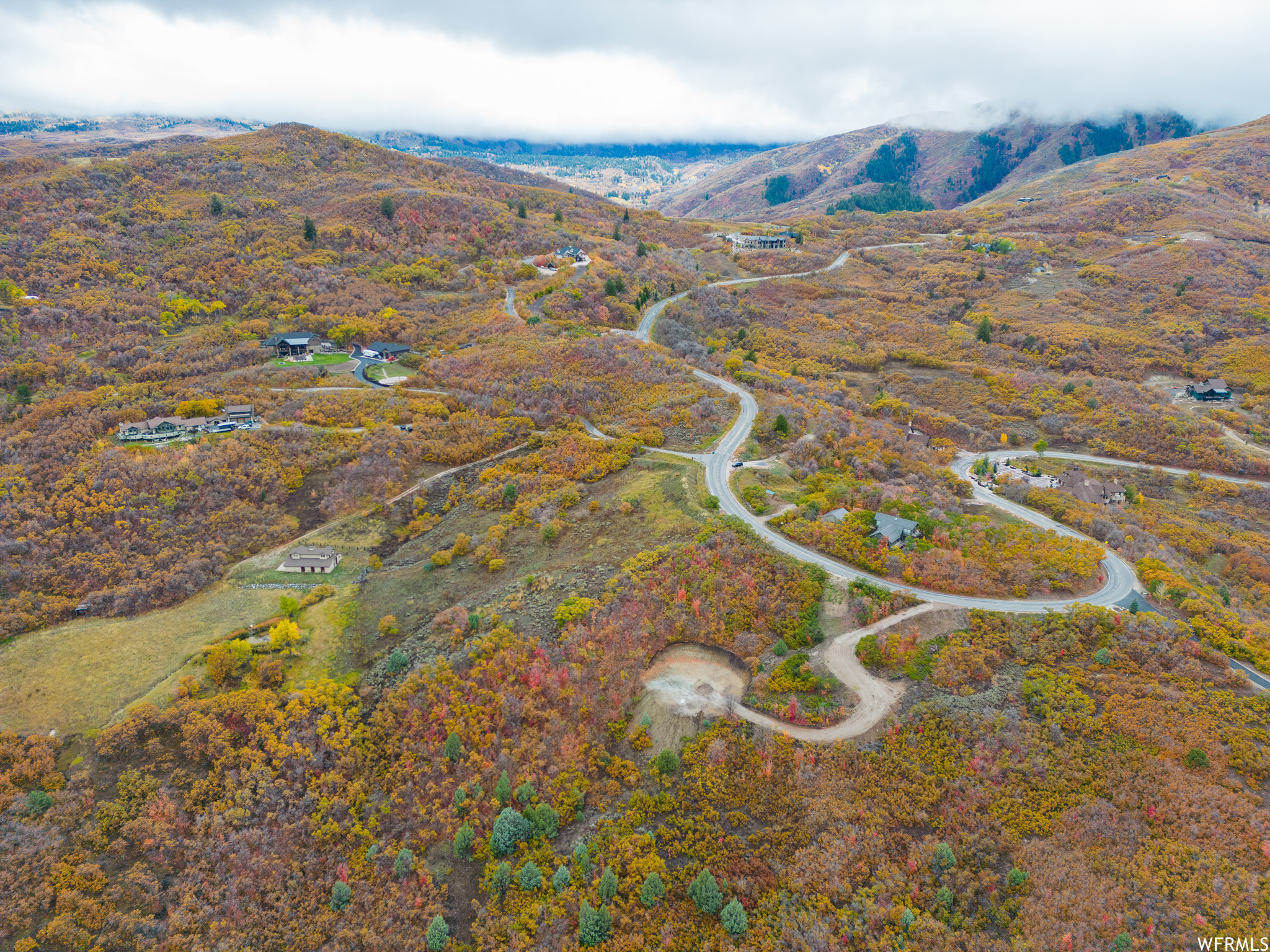 Birds eye view of property with a mountain view