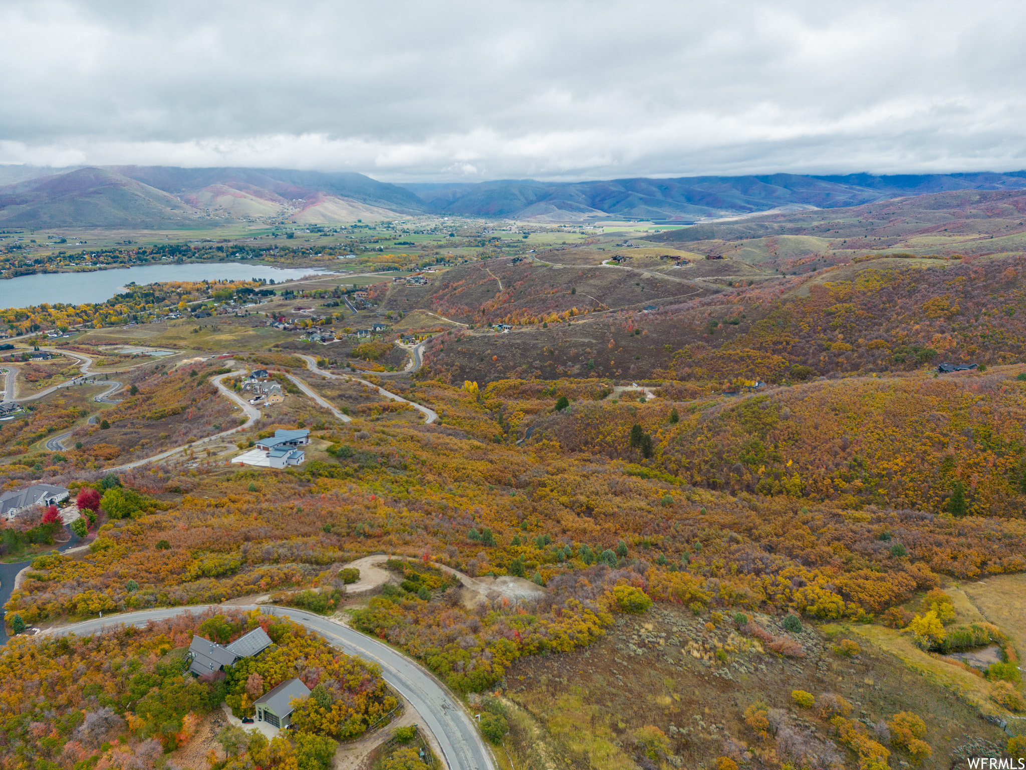 Aerial view with a water and mountain view