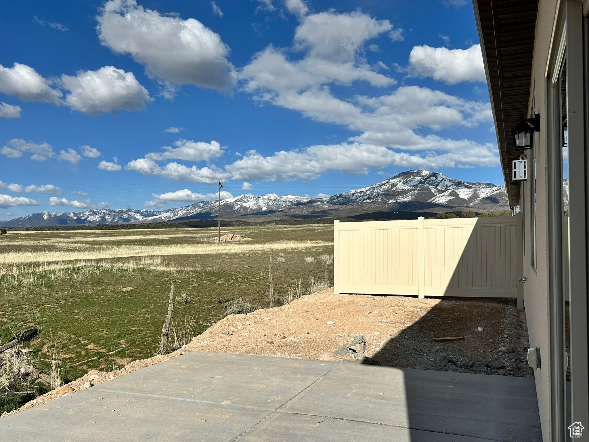 View of yard with a patio area and a mountain view