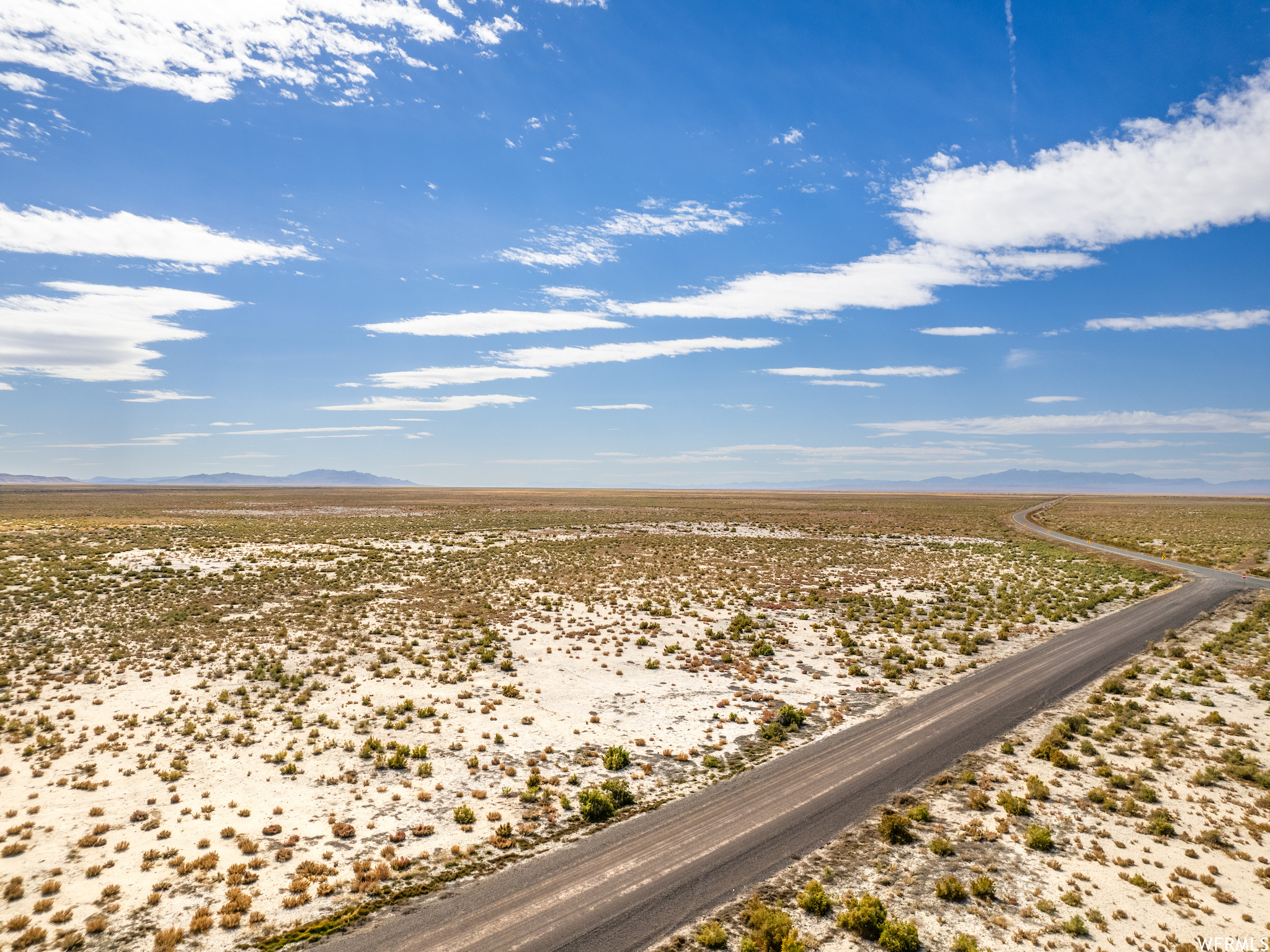 Birds eye view of property featuring a rural view