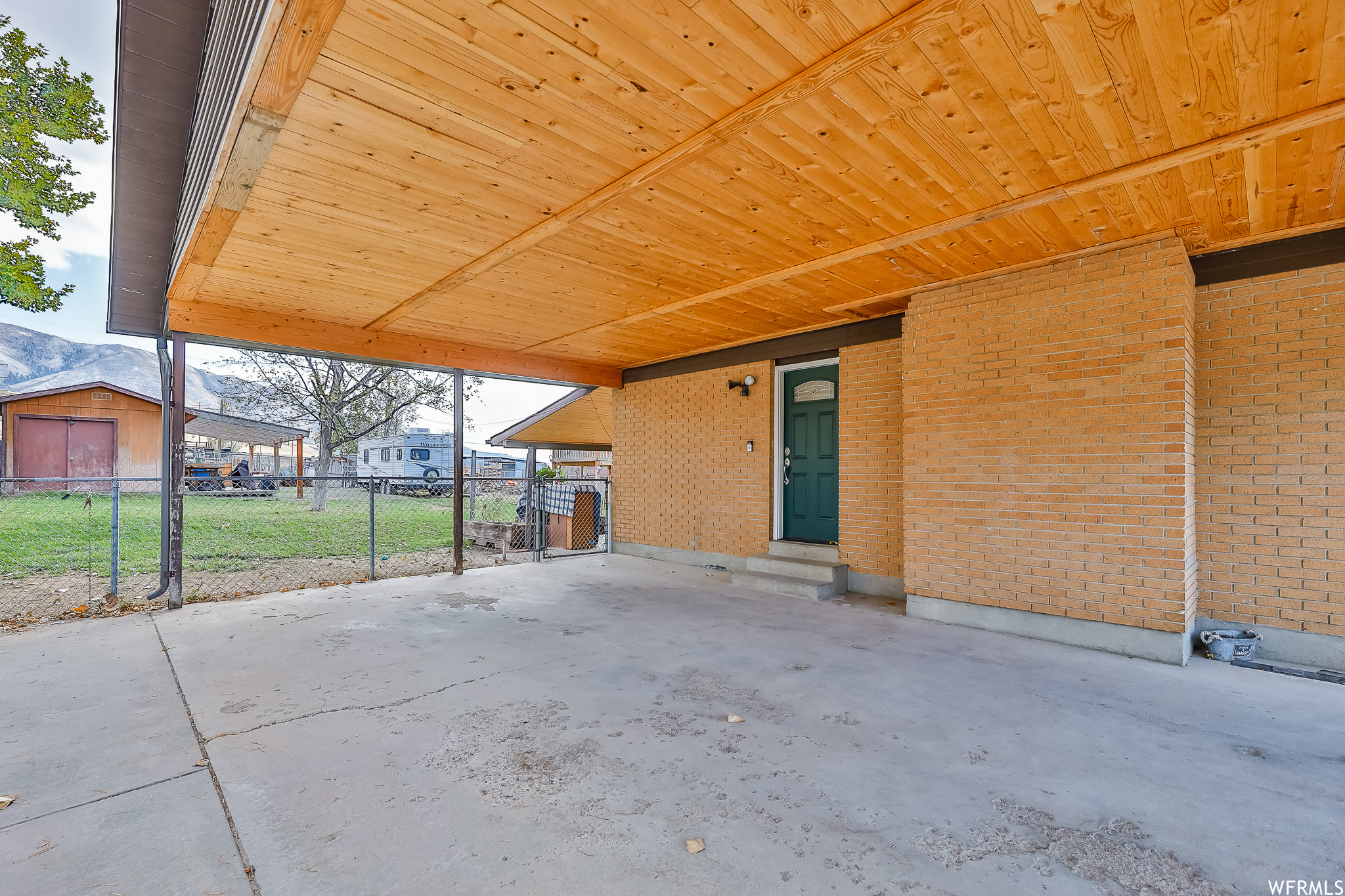 Carport with side entrance