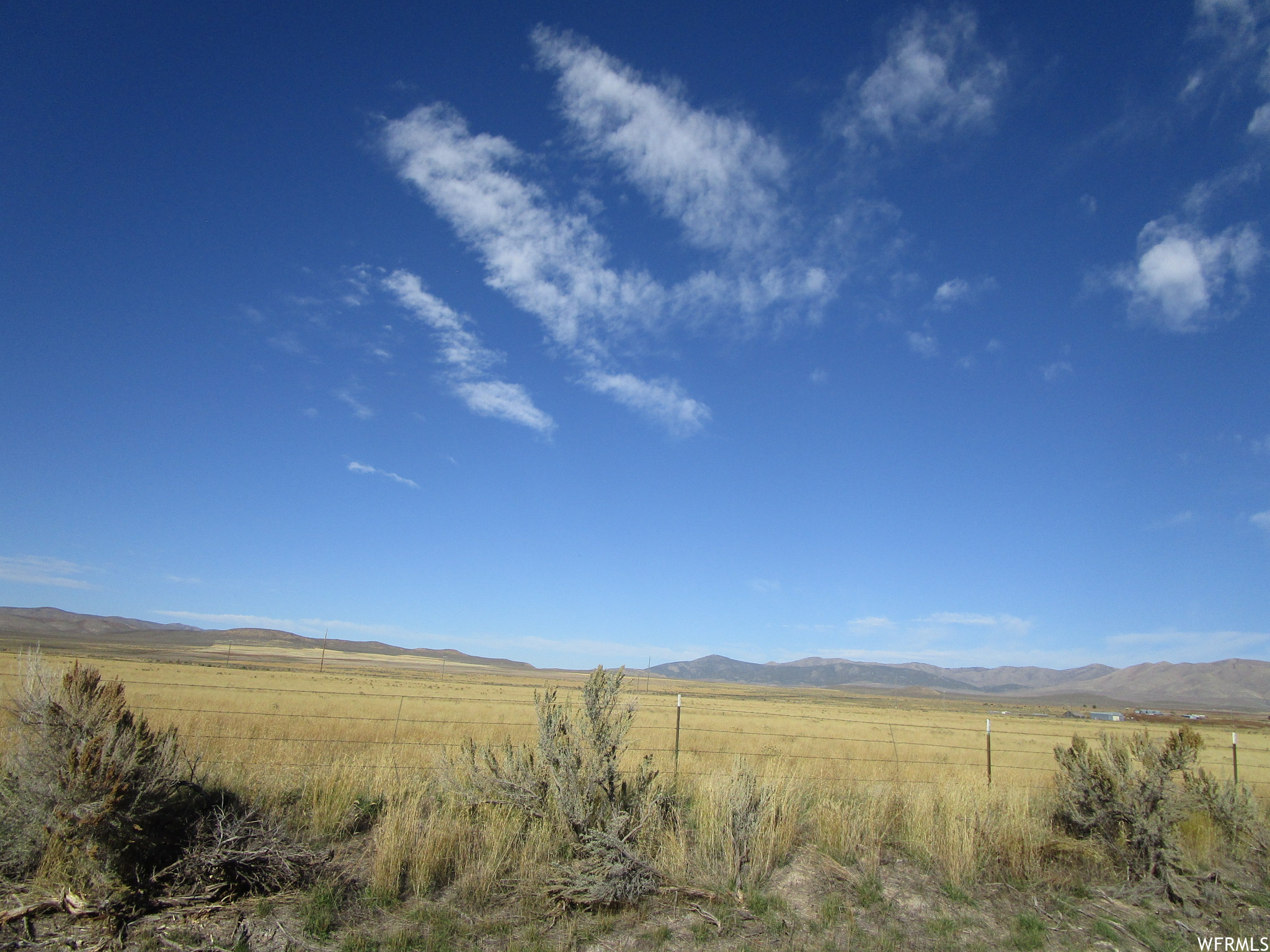 View of nature featuring a mountain view and a rural view