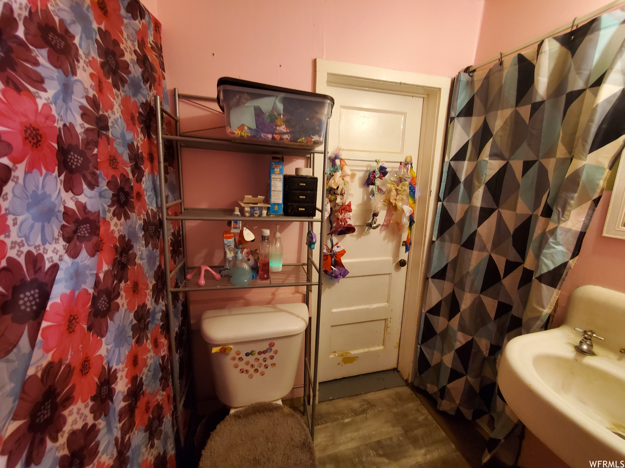 Bathroom with sink and toilet