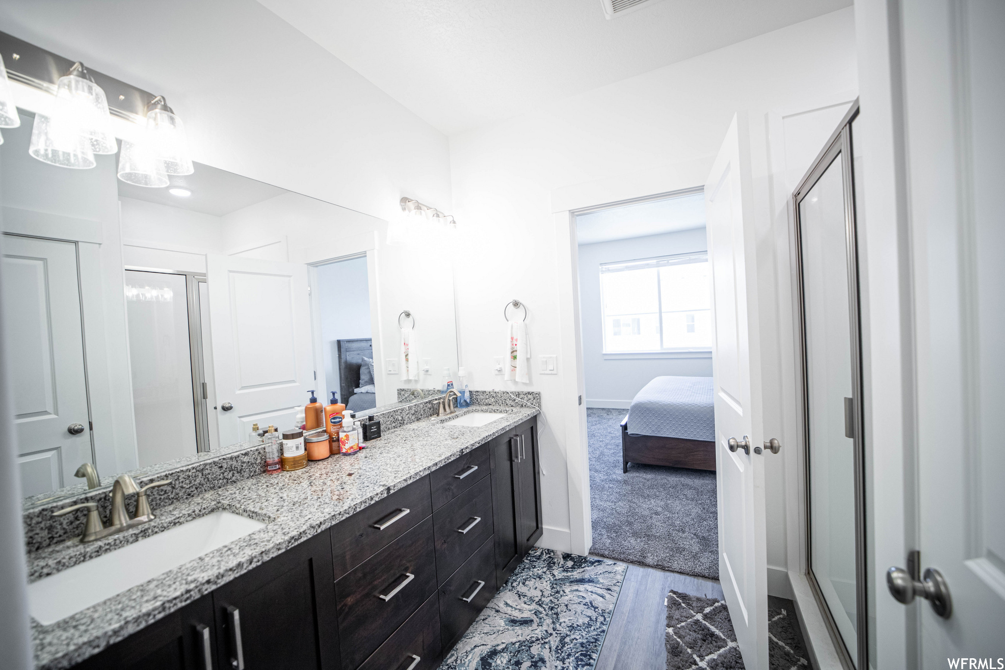 Bathroom with dual bowl vanity