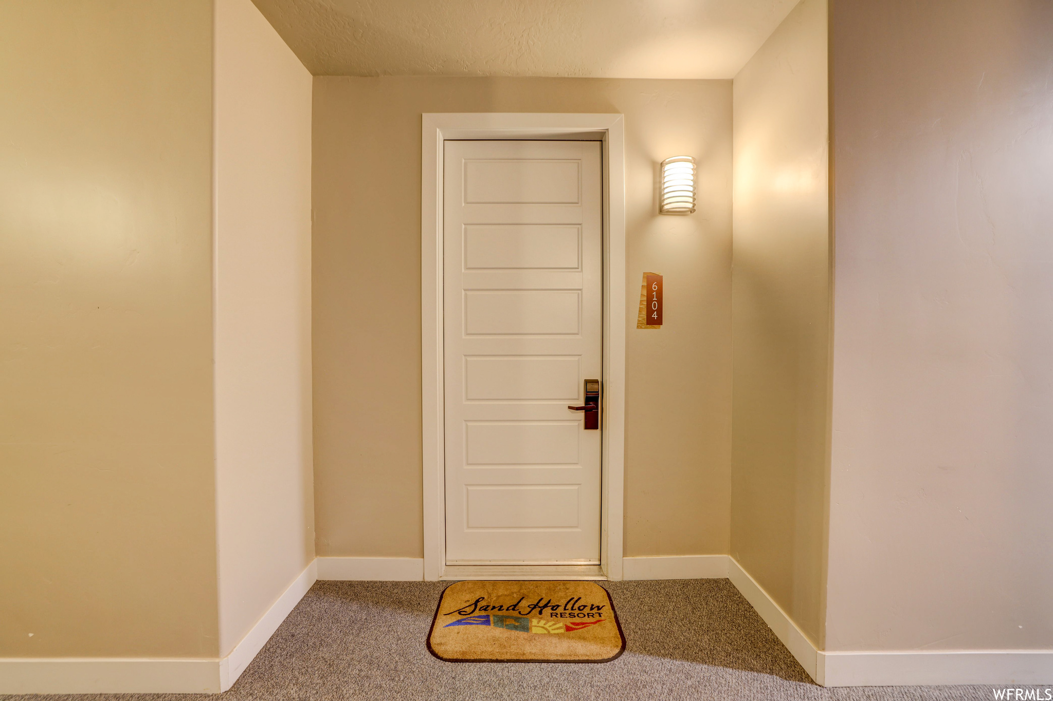 Interior space with light colored carpet