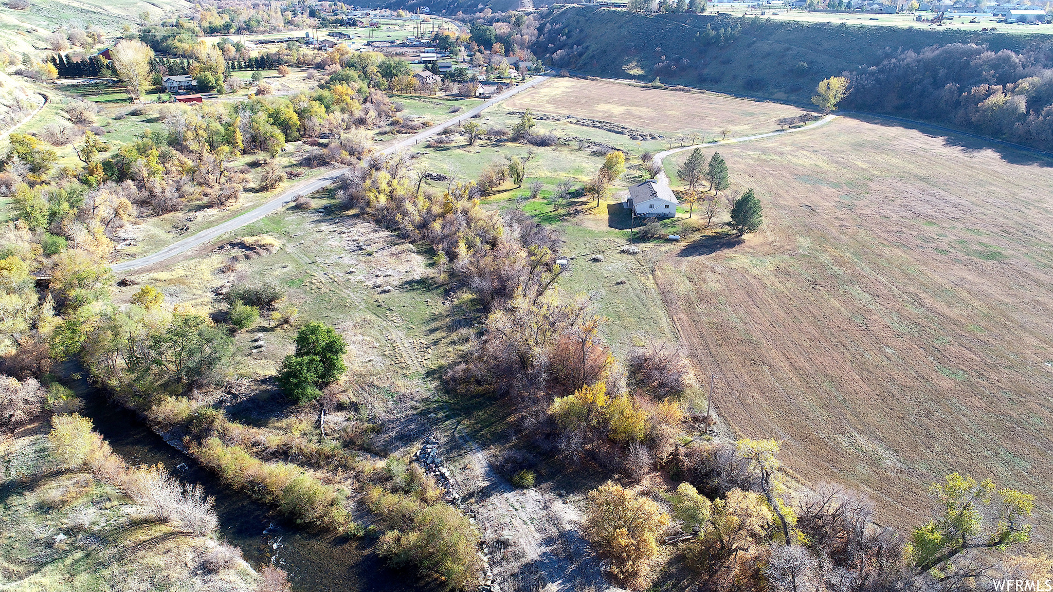 View of aerial view of home, Blacksmith Fork River and acreage