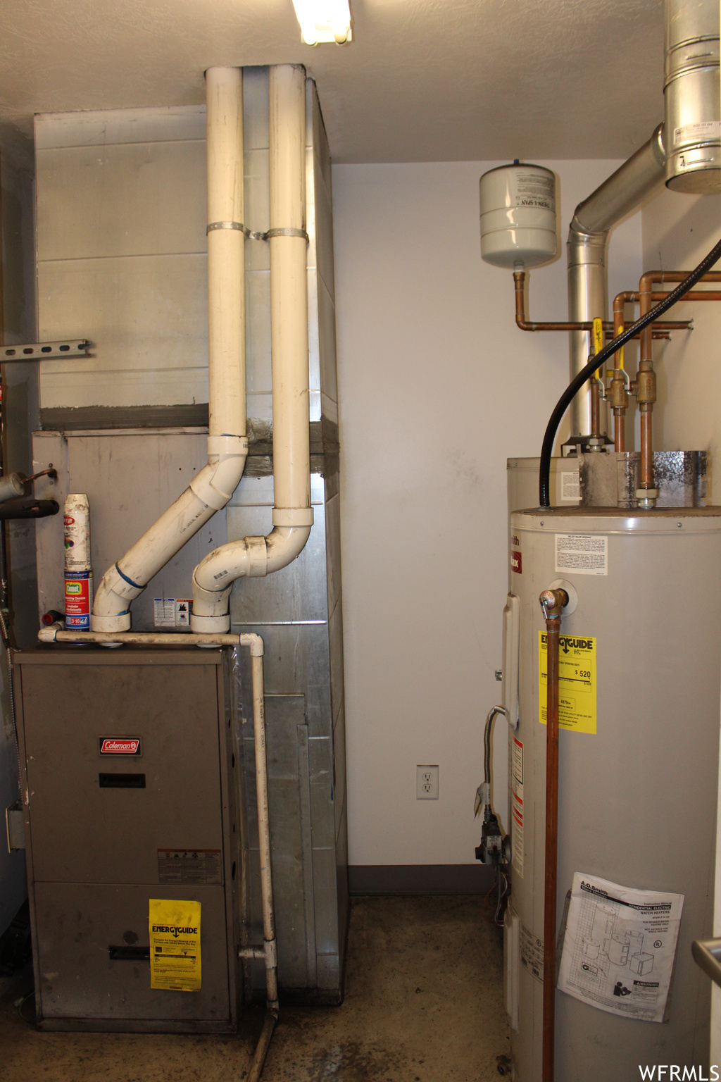 Utility room with electric water heater