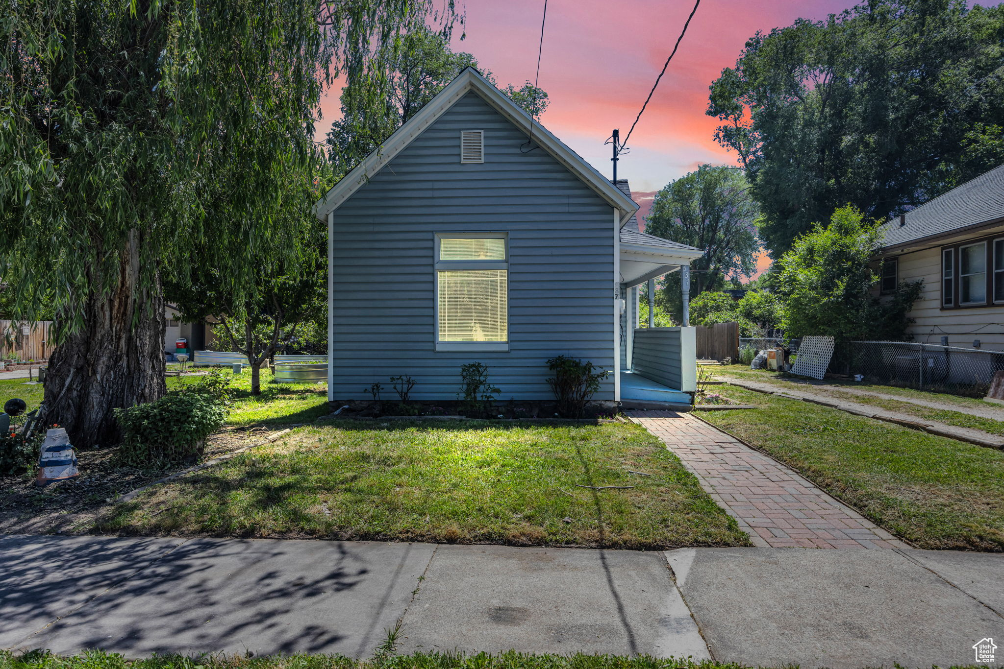 View of front of home featuring a yard