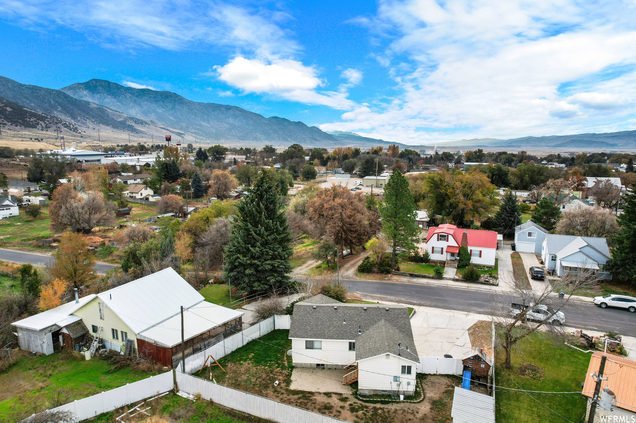 Birds eye view of property with a mountain view