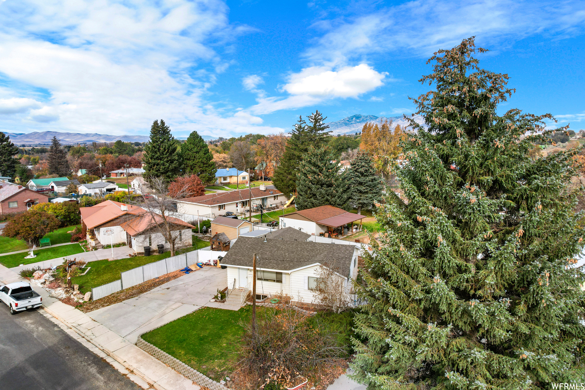 Birds eye view of property with a mountain view