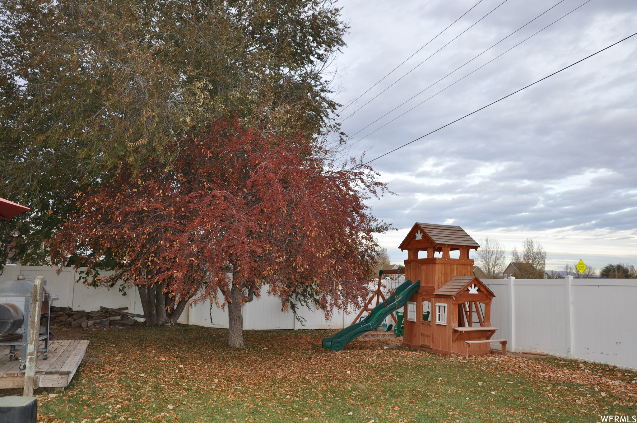 View of yard with a playground