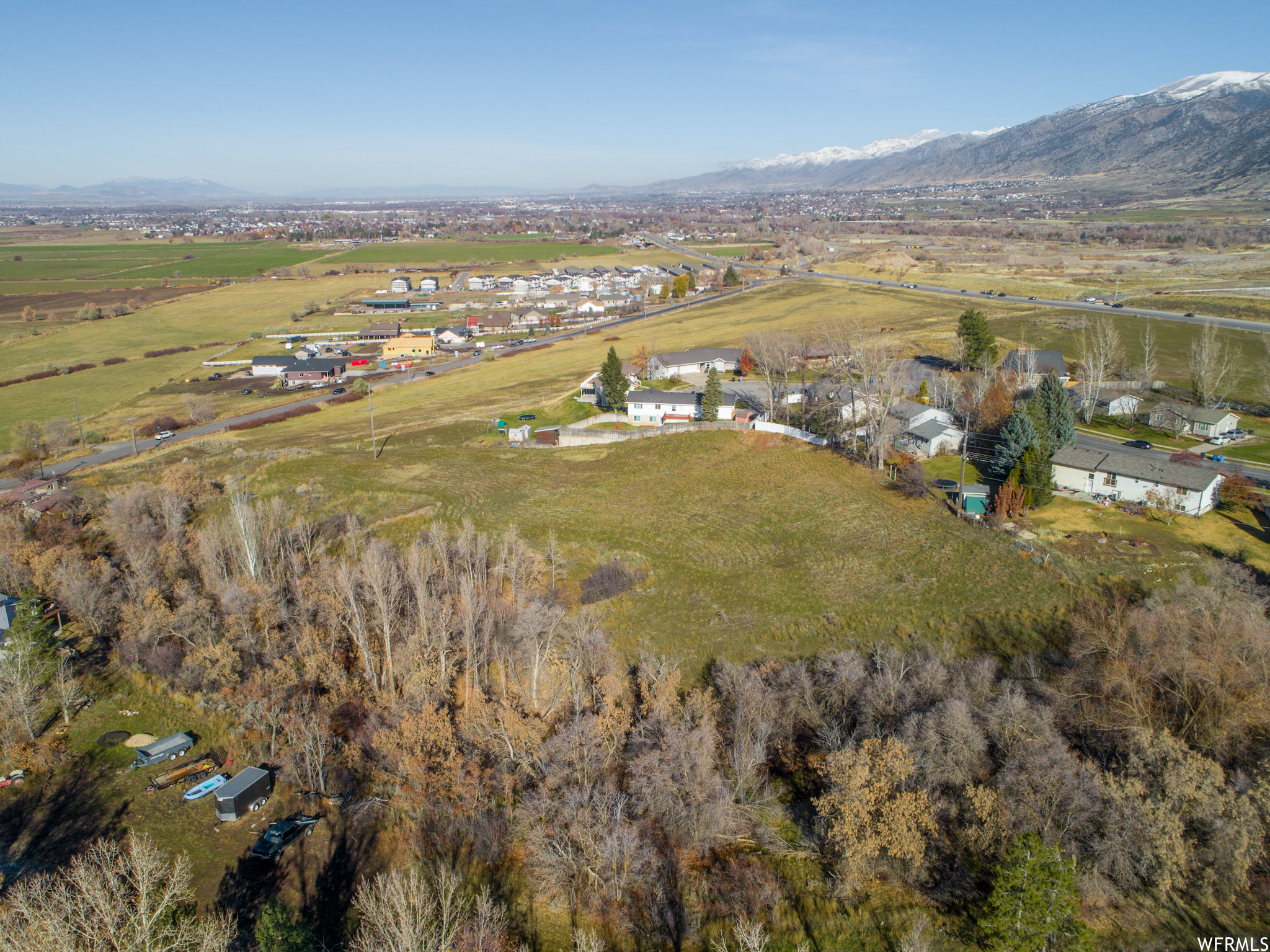 Birds eye view of property with a mountain view