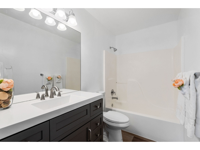 Master Full bathroom featuring shower / bathtub combination, toilet, and vanity