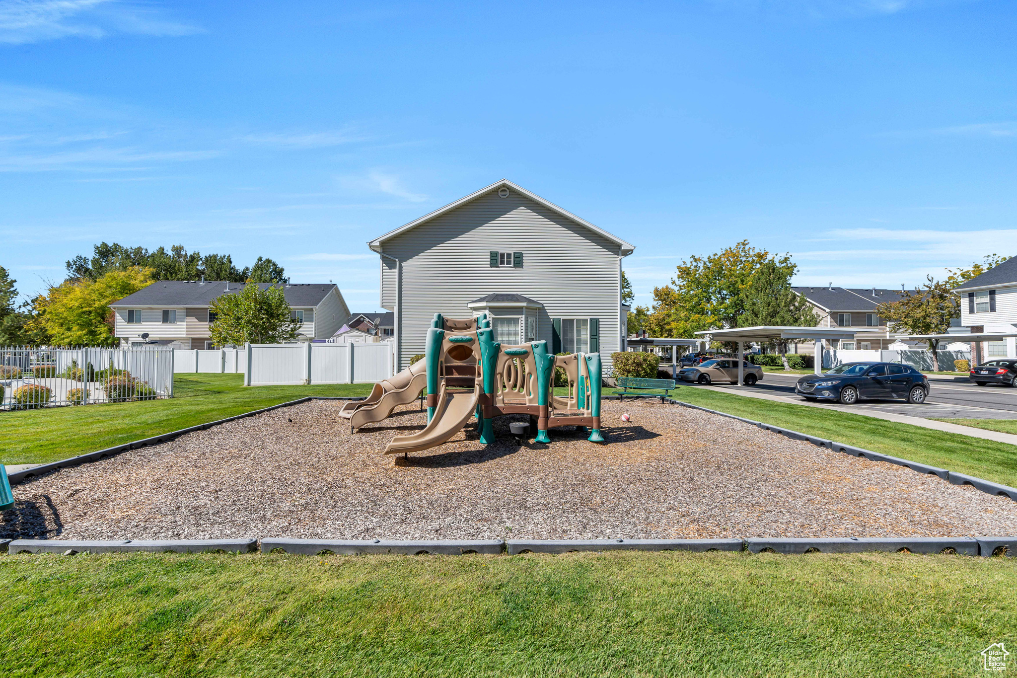 View of play area featuring a lawn