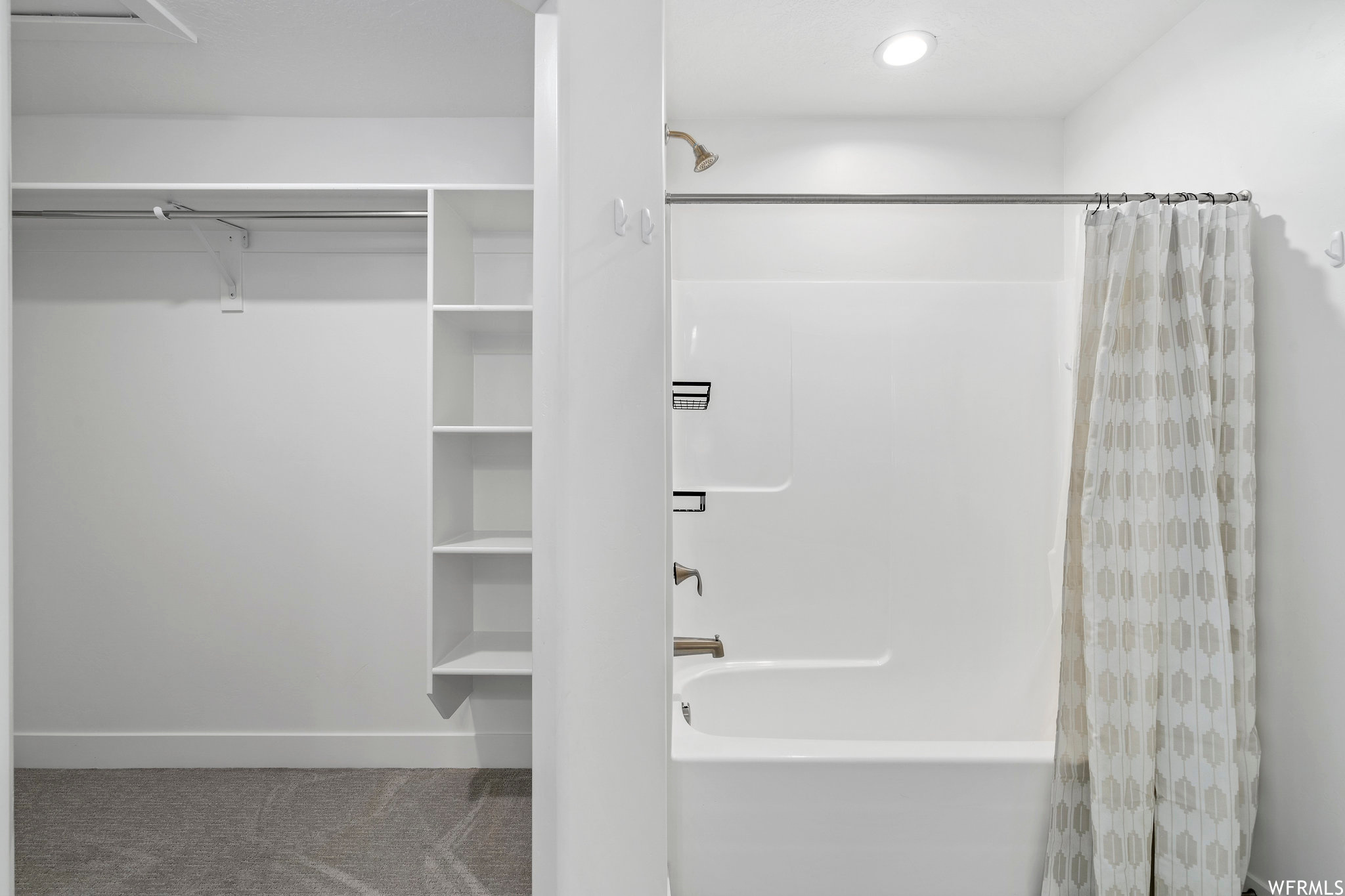 Bathroom with shower / bathtub combination with curtain