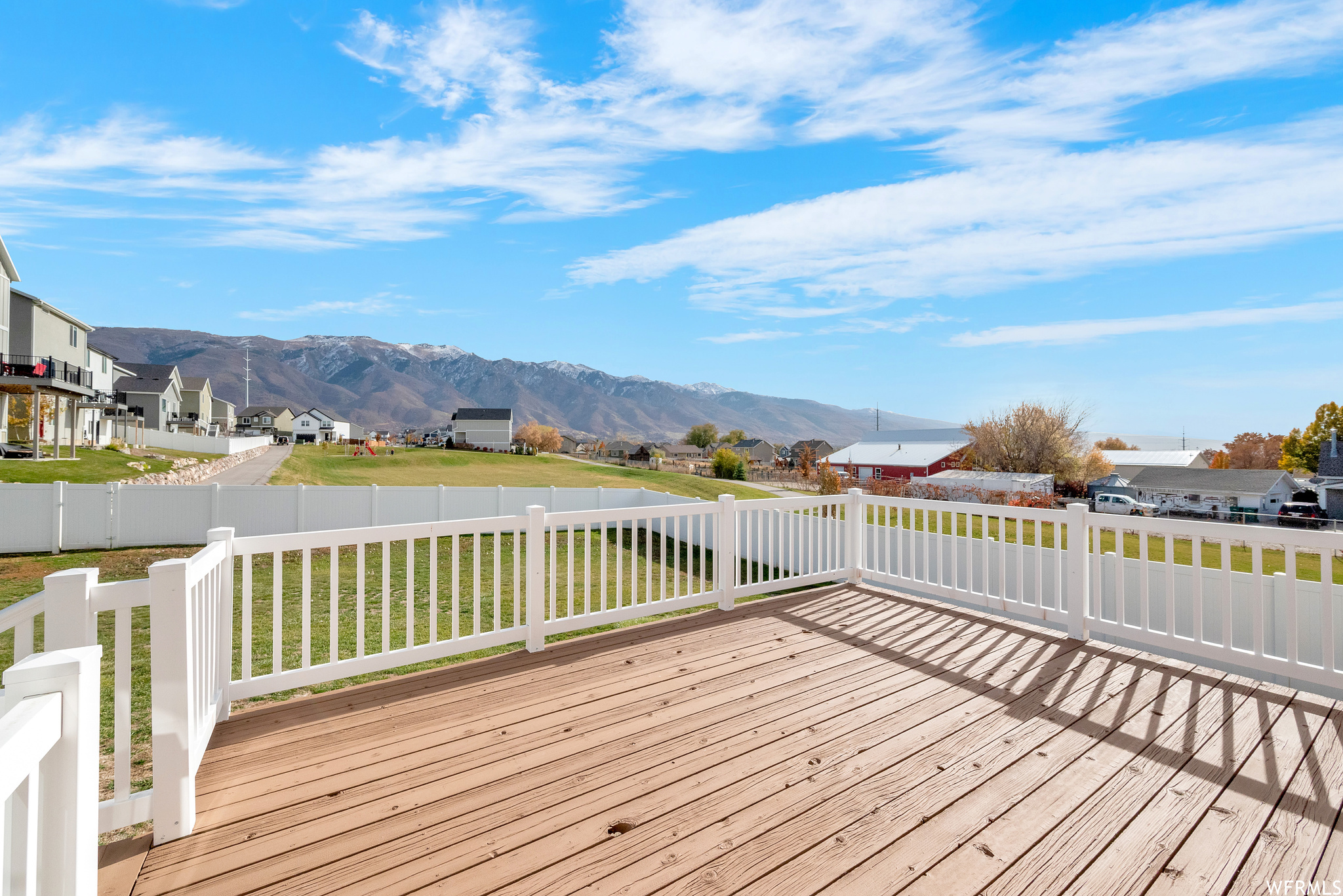 Huge deck off of family room  has shade in the summer time and mountain views all year long