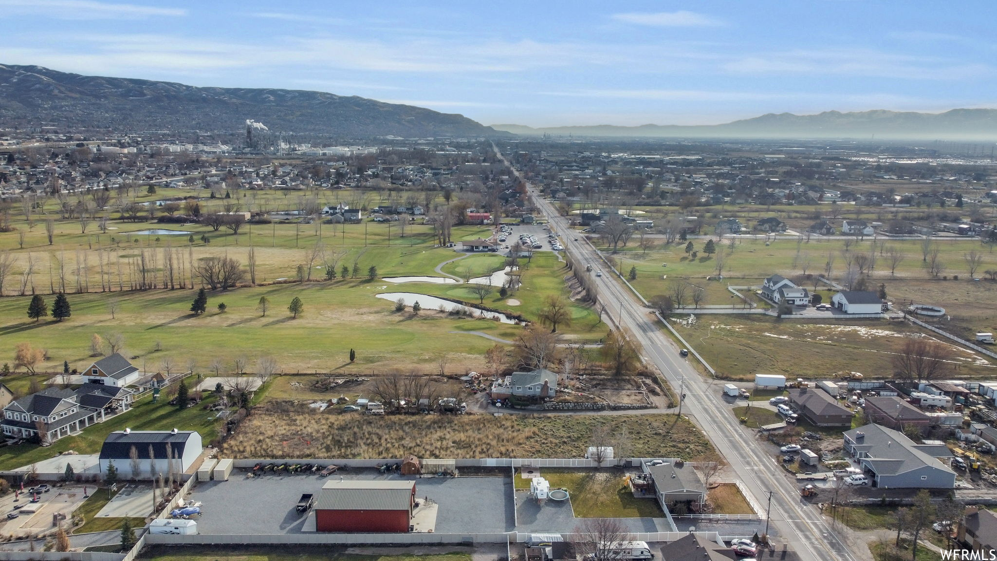 Drone / aerial view looking south and featuring Lakeview golf course