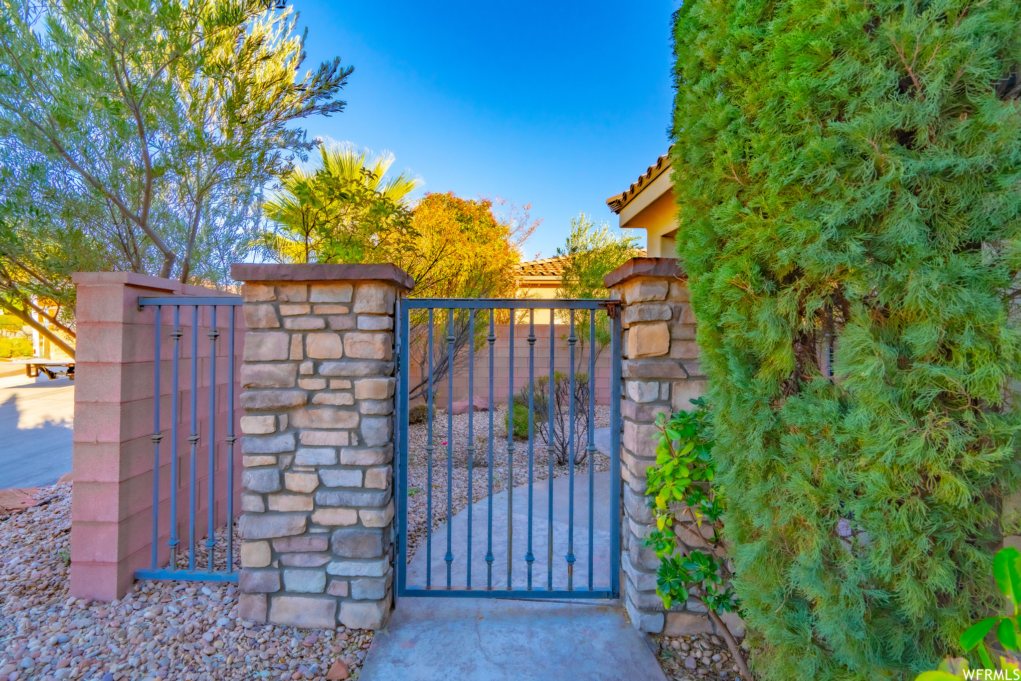 View of gate to covered patio