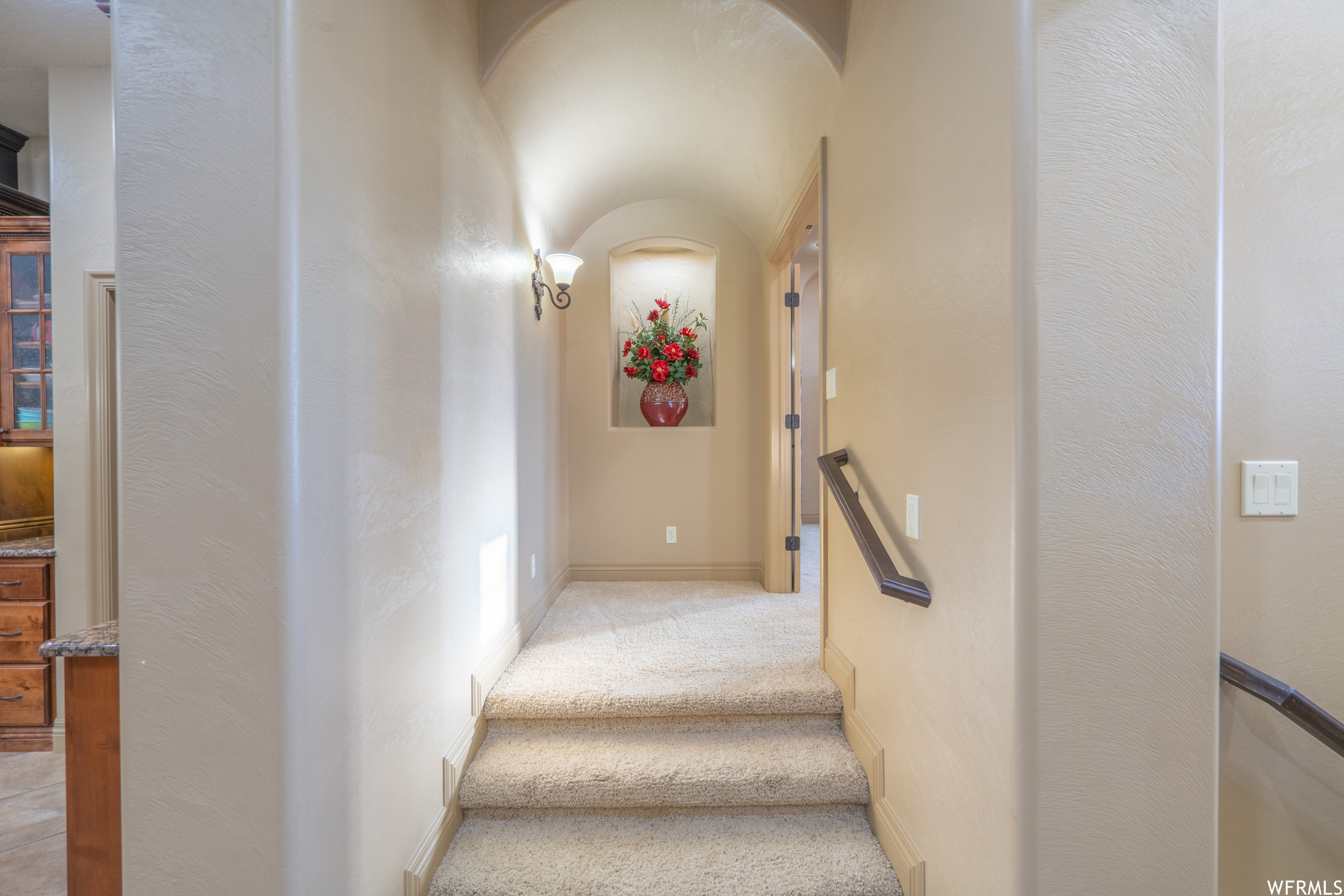 Stairs with light colored carpet. 3 steps up to master suite.