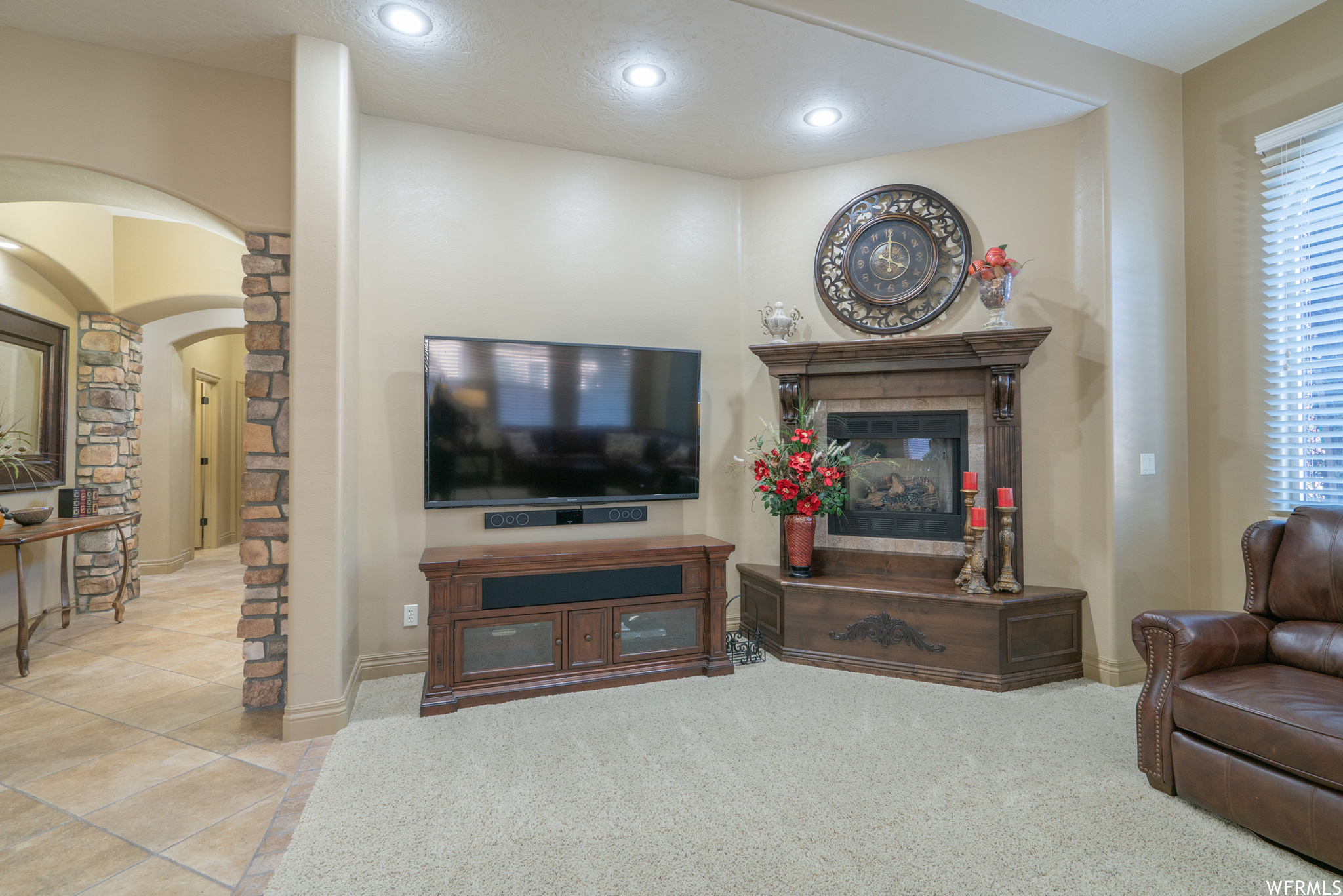 Living room featuring light colored carpet