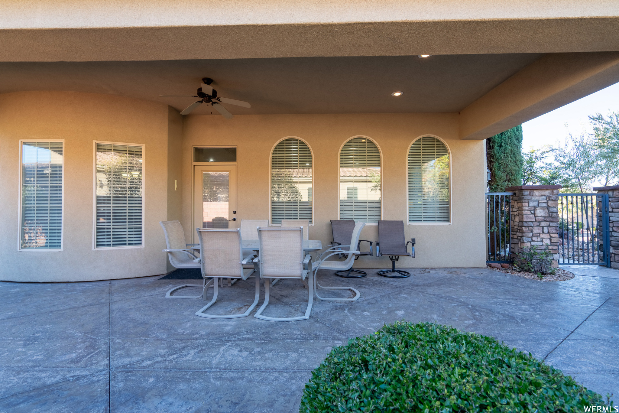 View of patio with ceiling fan