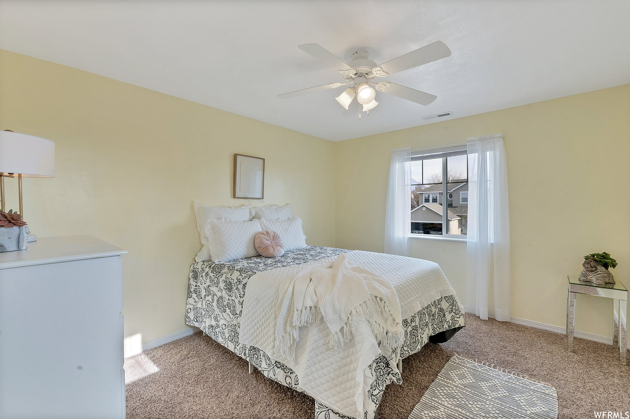 Bedroom with beautiful view of mountains, ceiling fan, extra large closet and built in desk.