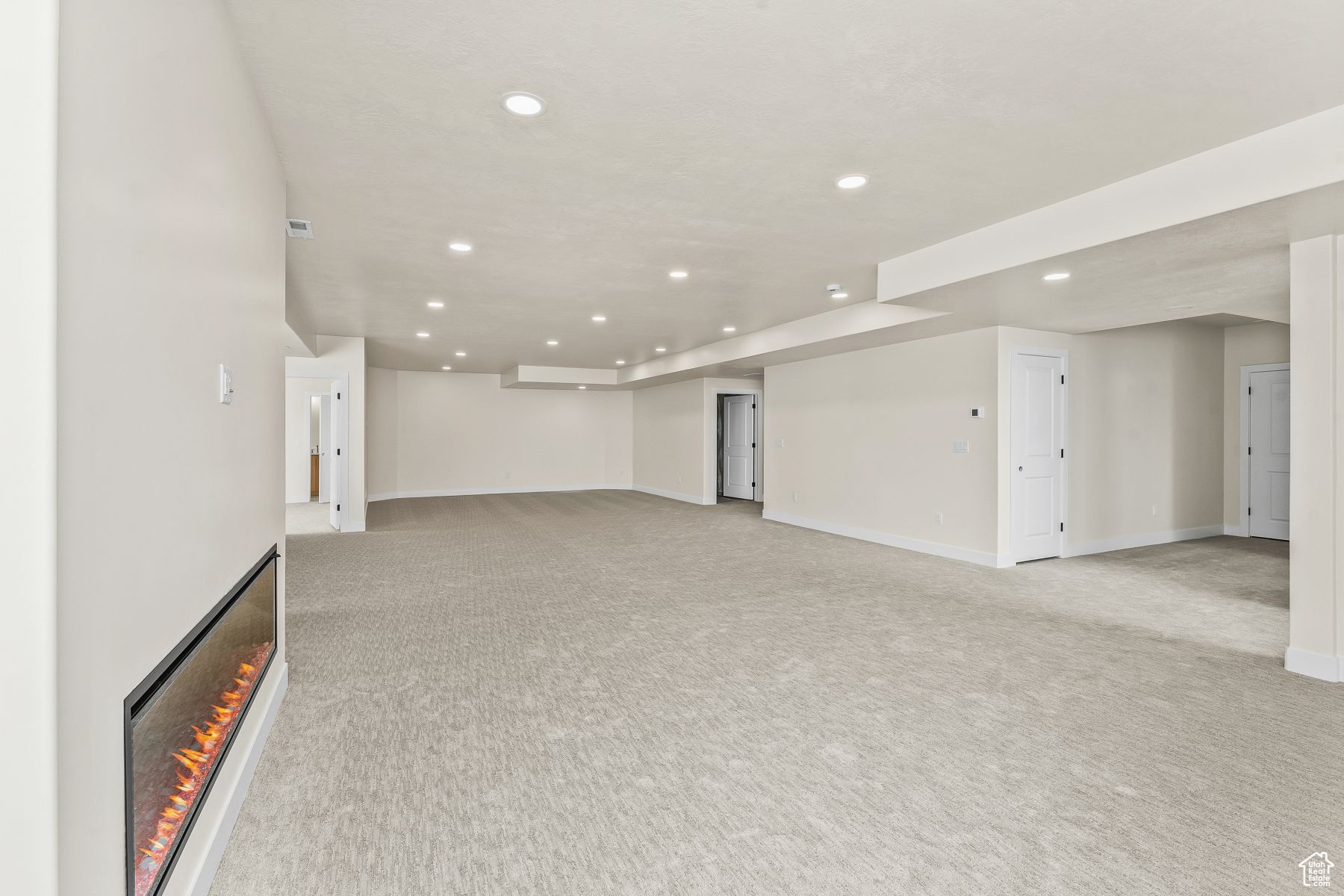 Interior space with light colored carpet