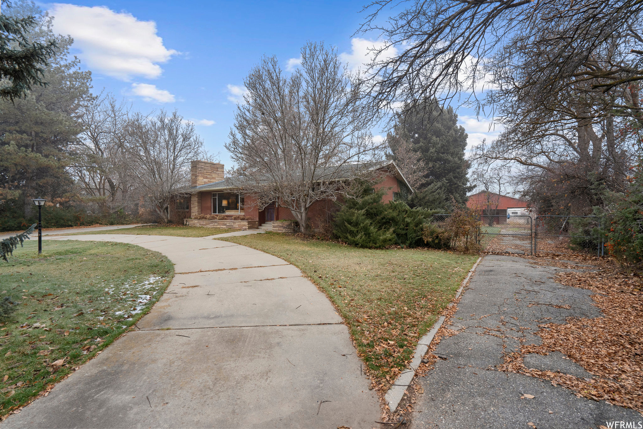 Front of Home-East to West with Side driveway towards barn