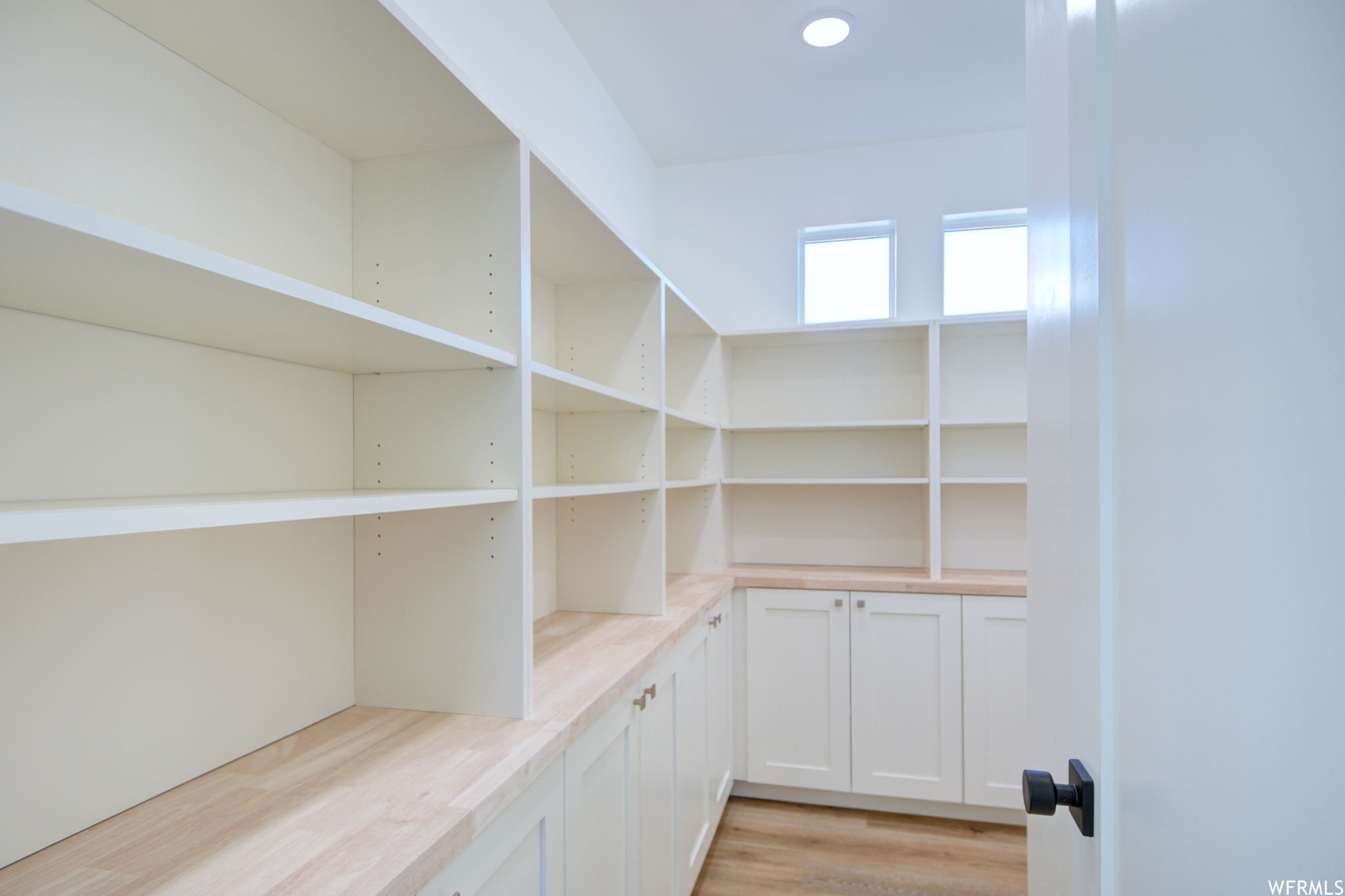 Large Walk-In Pantry with Built-In Cabinetry