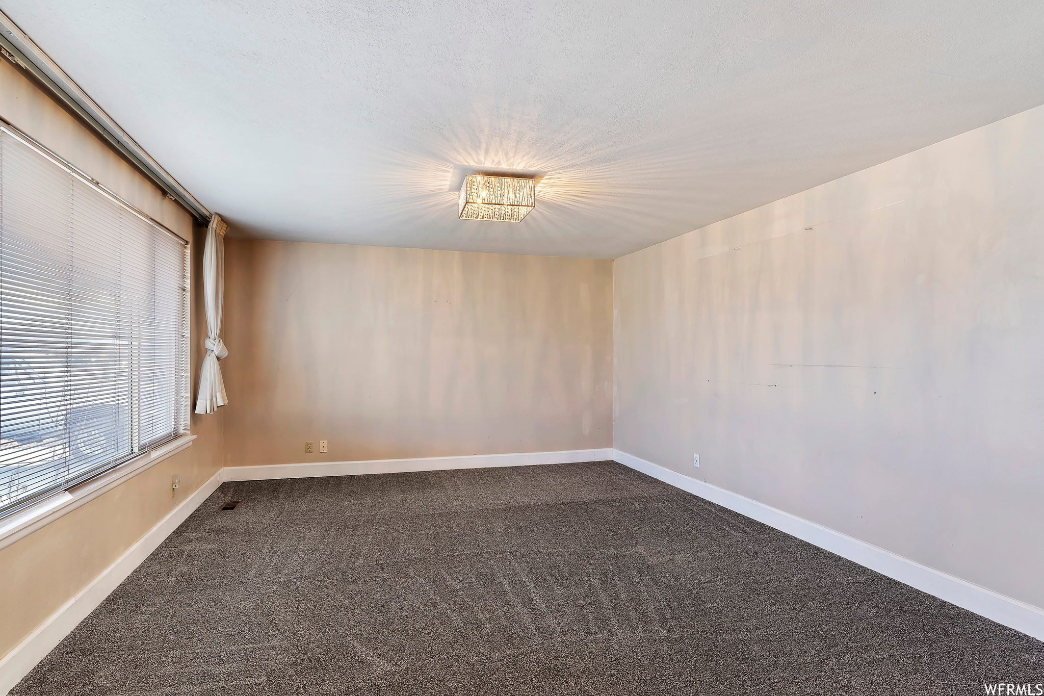 View of carpeted formal living room